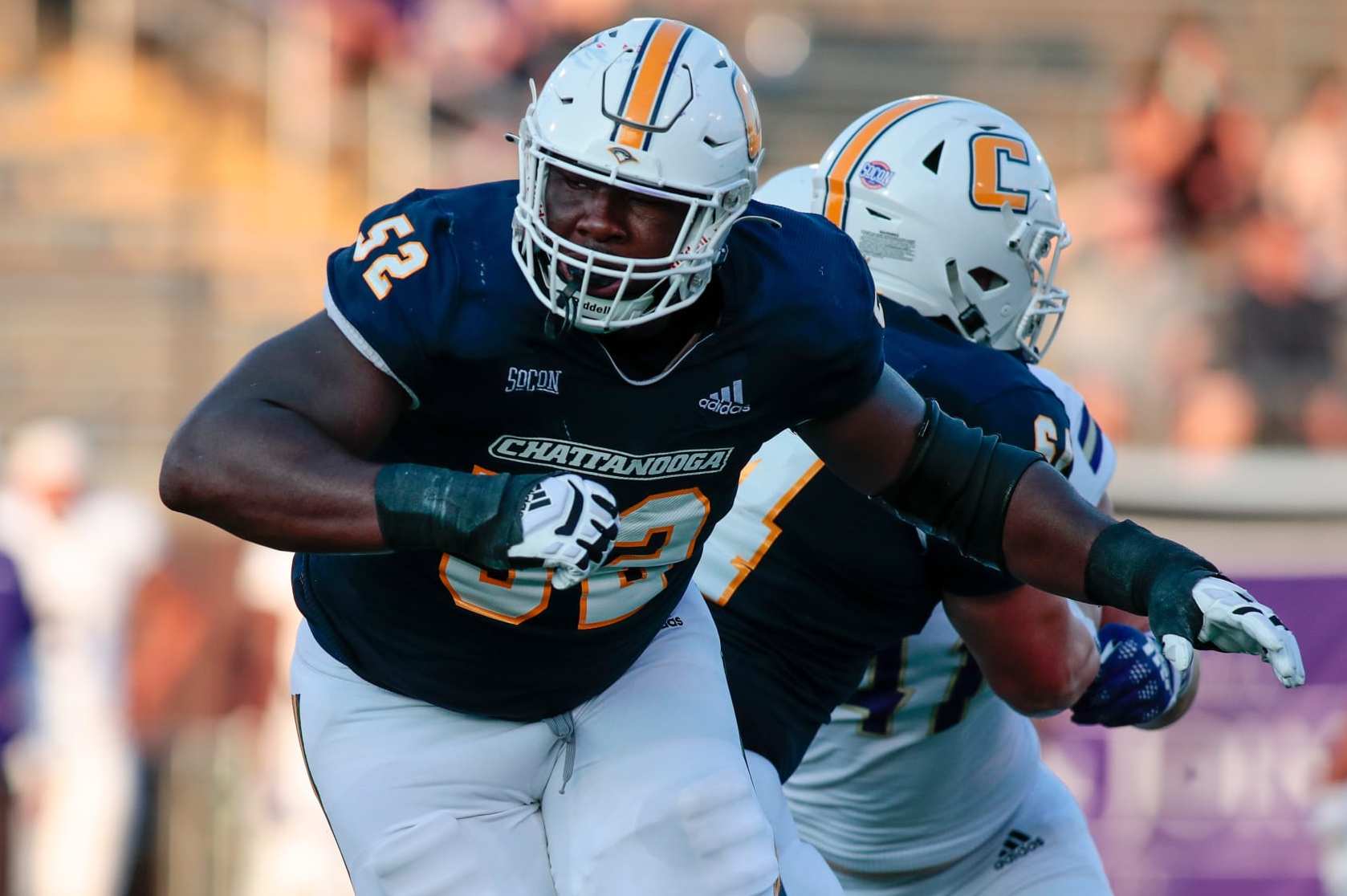 CHATTANOOGA, TN - SEPTEMBER 17: Chattanooga Mocs offensive lineman McClendon Curtis (52) in action during the game between the Chattanooga Mocs and the North Alabama Lions on September 17, 2022 at Finley Stadium in Chattanooga, Tennessee.(Photo by Charles Mitchell/Icon Sportswire via Getty Images)