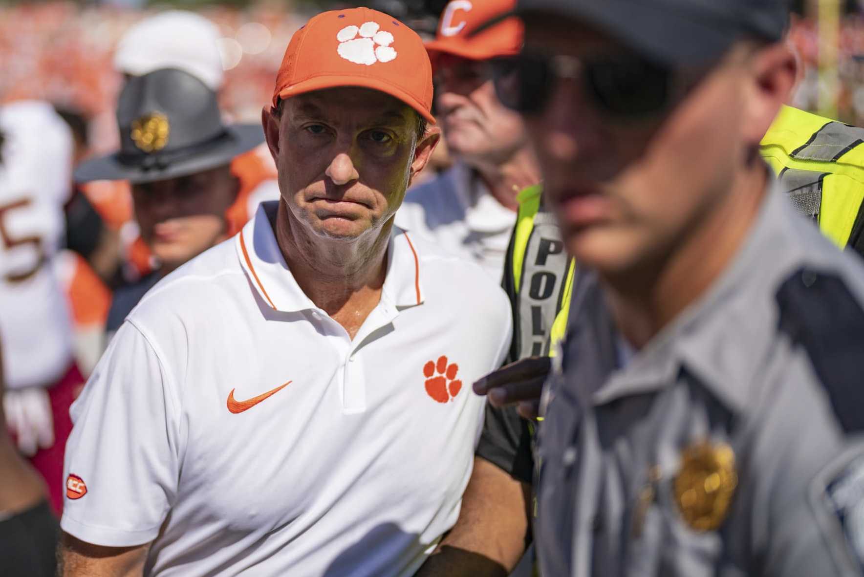 Clemson head coach Dabo Swinney walks off the field after losing to Florida State in overtime in an NCAA college football game Saturday, Sept. 23, 2023, in Clemson, S.C. (AP Photo/Jacob Kupferman)