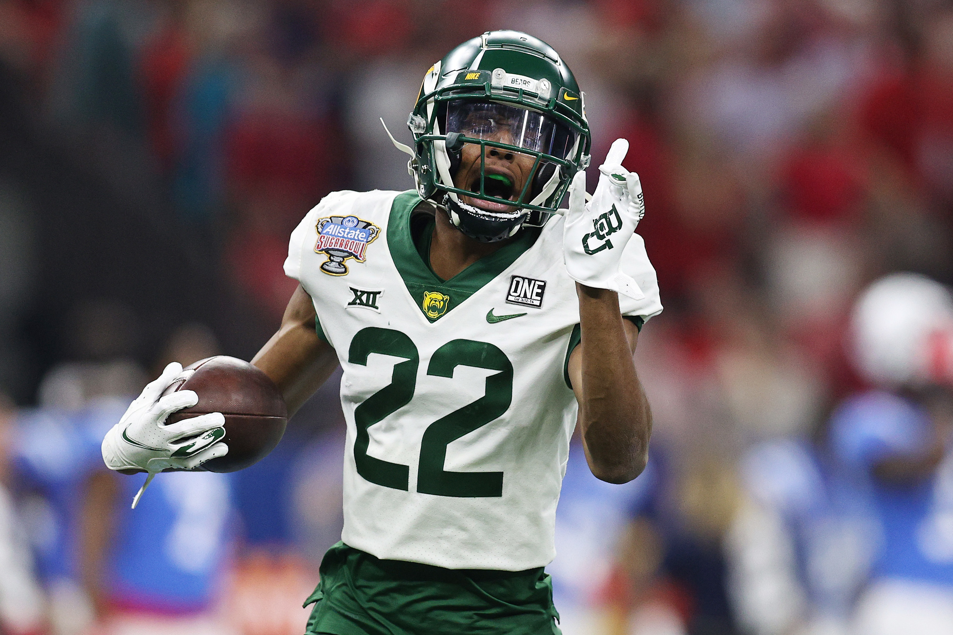 FILE - Baylor defensive back JT Woods prepares to run the 40-yard