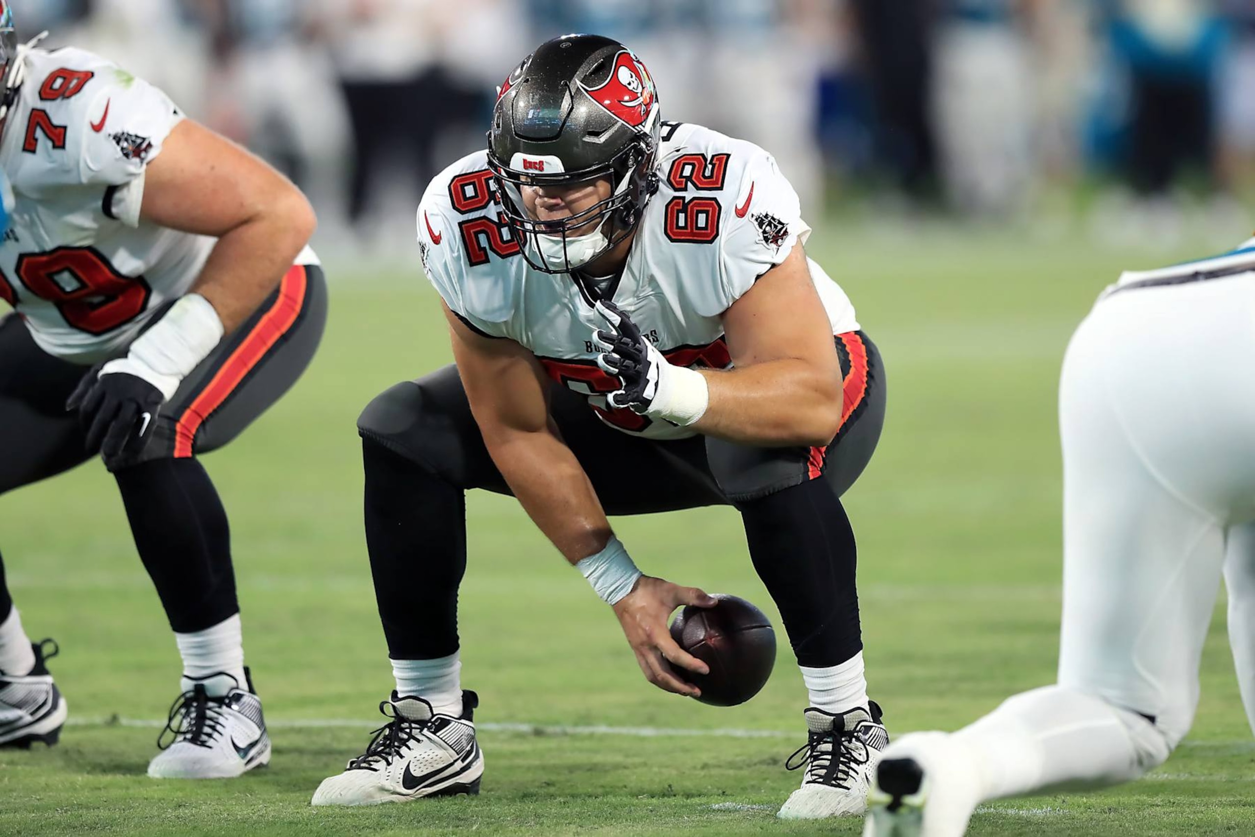 JACKSONVILLE, FL - August 17: Tampa Bay Buccaneers Center Graham Barton (62) snaps the ball during the preseason game between the Tampa Bay Buccaneers and the Jacksonville Jaguars on August 17, 2024 at EverBank Stadium in Jacksonville, FL. (Photo by Cliff Welch/Icon Sportswire via Getty Images) JACKSONVILLE, FL - August 17: Tampa Bay Buccaneers Center Graham Barton (62) snaps the ball during the preseason game between the Tampa Bay Buccaneers and the Jacksonville Jaguars on August 17, 2024 at EverBank Stadium in Jacksonville, FL. (Photo by Cliff Welch/Icon Sportswire via Getty Images)