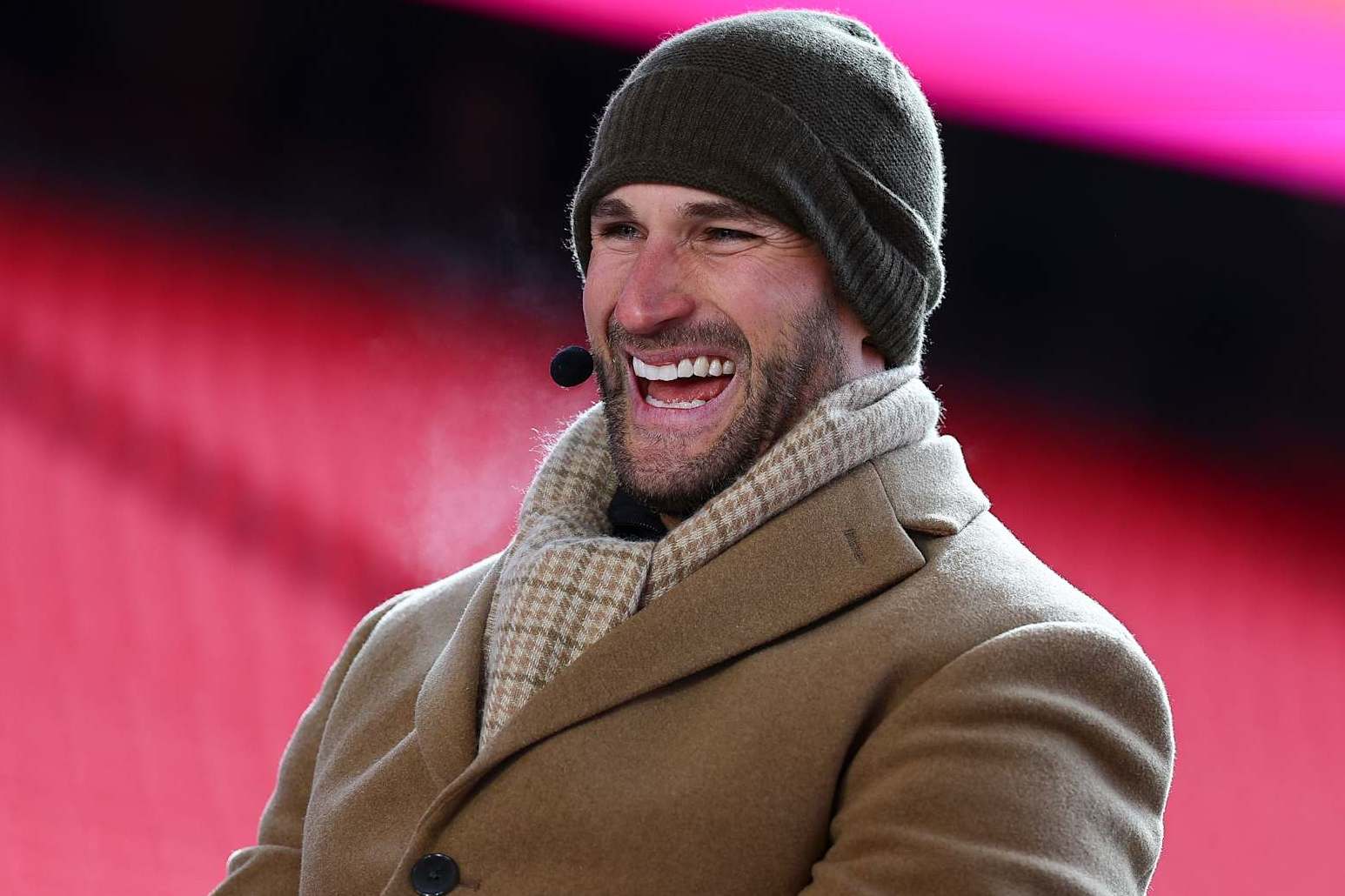 KANSAS CITY, MISSOURI - JANUARY 18: NFL quarterback Kirk Cousins on the ESPN set prior to the AFC Divisional playoff game between the Kansas City Chiefs and the Houston Texans at GEHA Field at Arrowhead Stadium on January 18, 2025 in Kansas City, Missouri. (Photo by Aaron M. Sprecher/Getty Images)