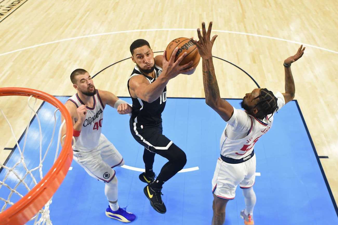 OCEANSIDE, CA - OCTOBER 8: Ben Simmons #10 of the Brooklyn Nets drives to the basket during the game against the LA Clippers during a NBA preseason game on October 8, 2024 at Frontwave Arena in Oceanside, California. NOTE TO USER: User expressly acknowledges and agrees that, by downloading and/or using this Photograph, user is consenting to the terms and conditions of the Getty Images License Agreement. Mandatory Copyright Notice: Copyright 2024 NBAE (Photo by Juan Ocampo/NBAE via Getty Images)