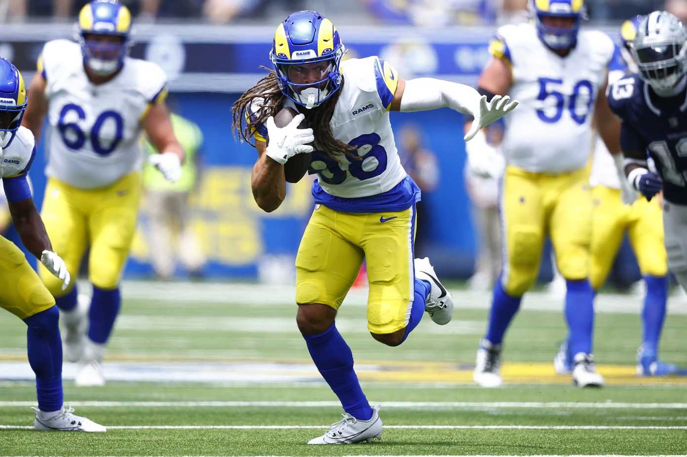 INGLEWOOD, CALIFORNIA - AUGUST 11: Jordan Whittington #88 of the Los Angeles Rams runs the ball against the Dallas Cowboys in the first half during a preseason game at SoFi Stadium on August 11, 2024 in Inglewood, California. (Photo by Ronald Martinez/Getty Images)