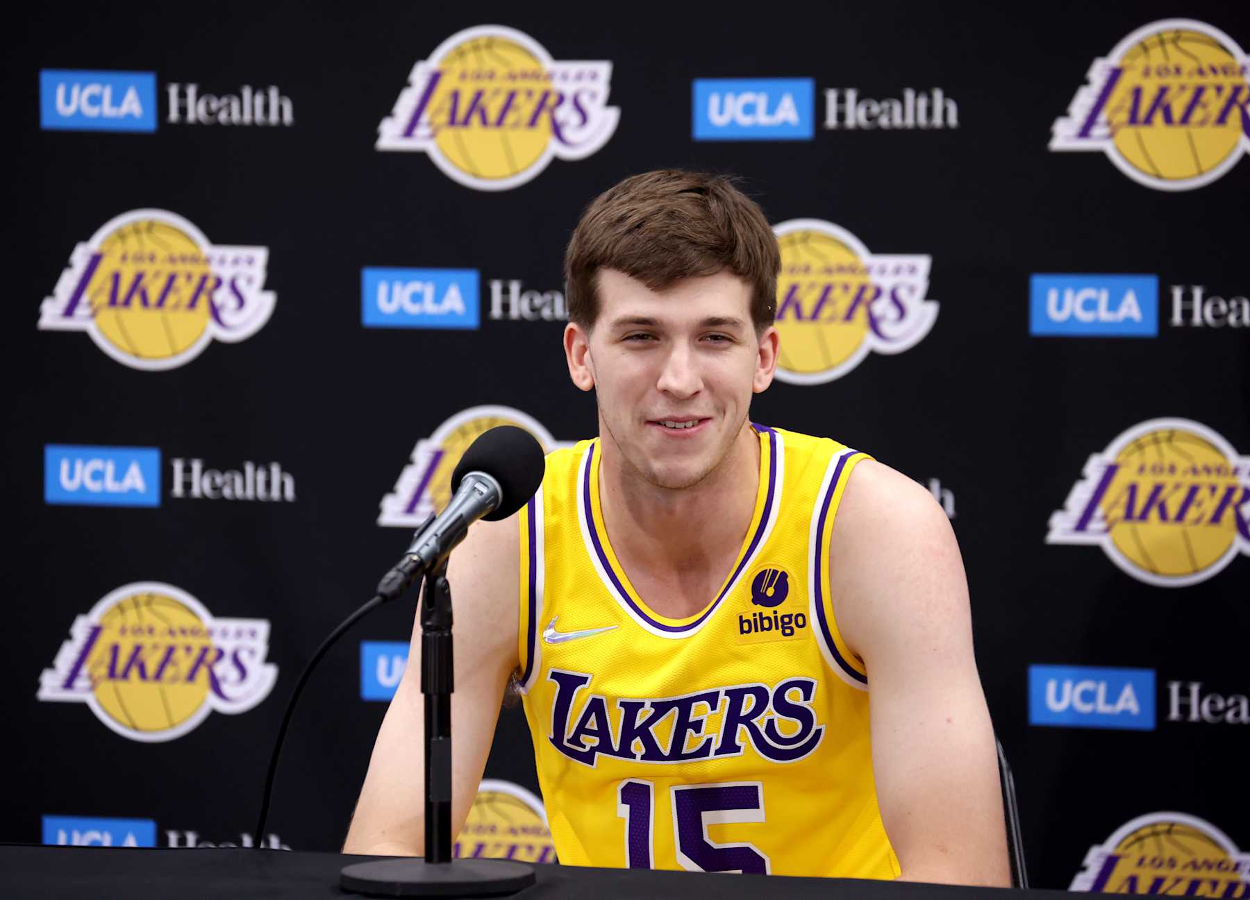 EL SEGUNDO, CALIFORNIA - SEPTEMBER 28: Austin Reaves #15 of the Los Angeles Lakers speaks to media at a press conference during Los Angeles Lakers media day at UCLA Health Training Center on September 28, 2021 in El Segundo, California. (Photo by Harry How/Getty Images)