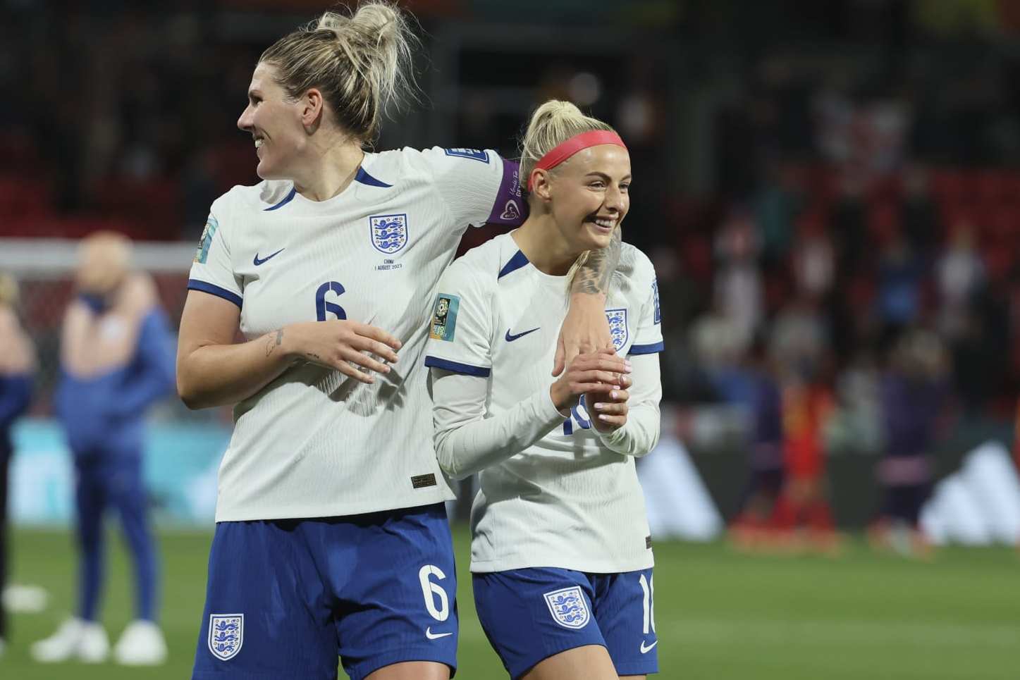 England's Millie Bright, left, celebrate with England's Chloe Kelly after the Women's World Cup Group D soccer match between China and England