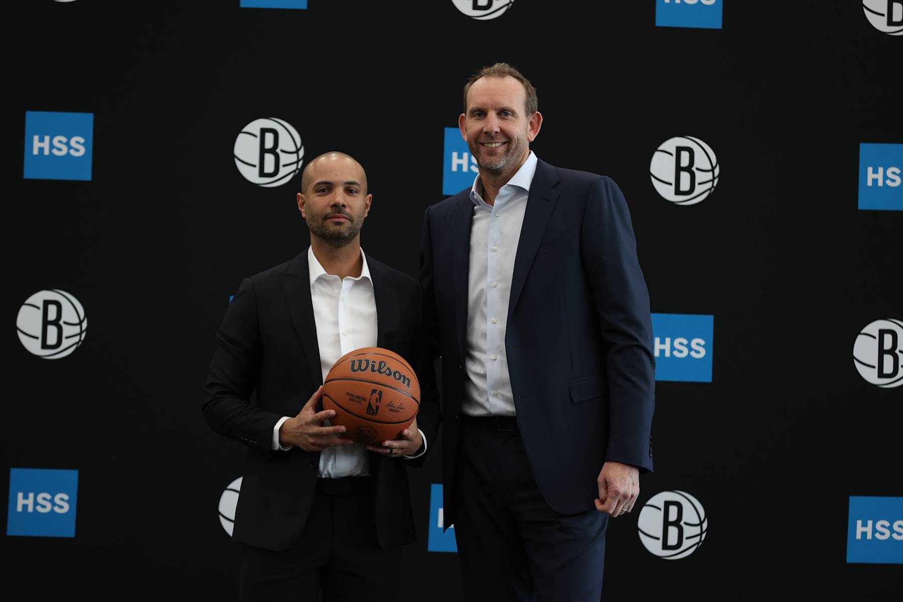 BROOKLYN, NY - APRIL 24: Jordi Fernandez along with Alternate Governor Sean Marks of the Brooklyn Nets pose for a photo after being introduced as Brooklyn Nets new head coach during a press conference on April 24, 2024 at the Nets Training Center in Brooklyn, New York. NOTE TO USER: User expressly acknowledges and agrees that, by downloading and or using this Photograph, user is consenting to the terms and conditions of the Getty Images License Agreement. Mandatory Copyright Notice: Copyright 2024 NBAE (Photo by Nathaniel S. Butler/NBAE via Getty Images)