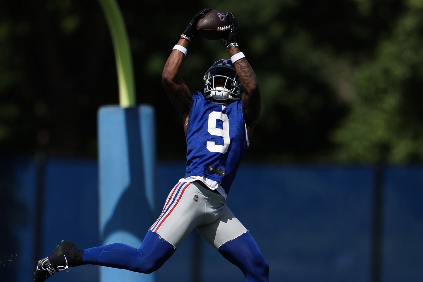 EAST RUTHERFORD, NEW JERSEY - MAY 30: Malik Nabers #9 of the New York Giants makes a catch during OTA Offseason Workouts at NY Giants Quest Diagnostics Training Center on May 30, 2024 in East Rutherford, New Jersey. (Photo by Luke Hales/Getty Images)