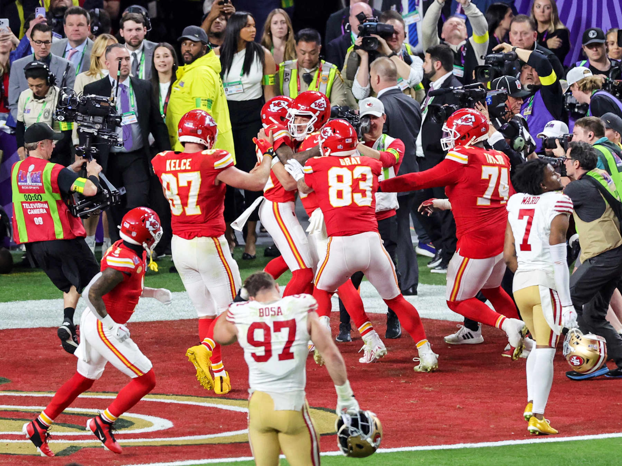 LAS VEGAS, NEVADA - FEBRUARY 11: Tight end Travis Kelce #87, wide receiver Mecole Hardman Jr. #12, quarterback Patrick Mahomes #15, tight end Noah Gray #83 and offensive tackle Jawaan Taylor #74 of the Kansas City Chiefs celebrate after Mahomes hit Hardman on a 3-yard touchdown pass in overtime against the San Francisco 49ers to win Super Bowl LVIII at Allegiant Stadium on February 11, 2024 in Las Vegas, Nevada. The Chiefs defeated the 49ers 25-22 in overtime. (Photo by Ethan Miller/Getty Images) LAS VEGAS, NEVADA - FEBRUARY 11: Tight end Travis Kelce #87, wide receiver Mecole Hardman Jr. #12, quarterback Patrick Mahomes #15, tight end Noah Gray #83 and offensive tackle Jawaan Taylor #74 of the Kansas City Chiefs celebrate after Mahomes hit Hardman on a 3-yard touchdown pass in overtime against the San Francisco 49ers to win Super Bowl LVIII at Allegiant Stadium on February 11, 2024 in Las Vegas, Nevada. The Chiefs defeated the 49ers 25-22 in overtime. (Photo by Ethan Miller/Getty Images)