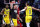 LAS VEGAS, NEVADA - DECEMBER 07: Aaron Nesmith #23, T.J. McConnell #9 and Tyrese Haliburton #0 of the Indiana Pacers celebrate after Haliburton hit a 3-pointer against the Milwaukee Bucks in the second half of the East semifinal game of the inaugural NBA In-Season Tournament at T-Mobile Arena on December 07, 2023 in Las Vegas, Nevada. The Pacers defeated the Bucks 128-119. NOTE TO USER: User expressly acknowledges and agrees that, by downloading and or using this photograph, User is consenting to the terms and conditions of the Getty Images License Agreement. (Photo by Ethan Miller/Getty Images)
