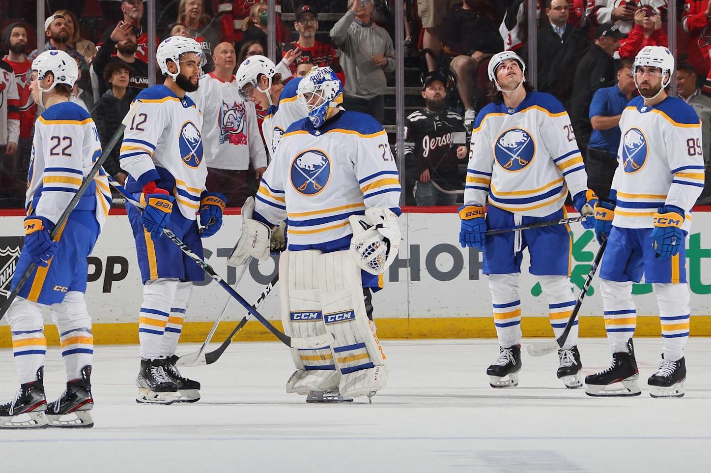 NEWARK, NEW JERSEY - APRIL 11: The Buffalo Sabres leave the ice following a 6-2 loss to the New Jersey Devils at the Prudential Center on April 11, 2023 in Newark, New Jersey. (Photo by Bruce Bennett/Getty Images)
