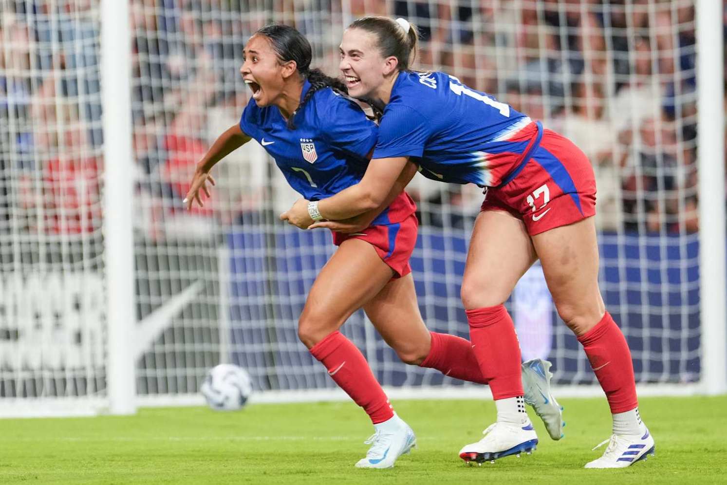 AUSTIN, TEXAS - OCTOBER 24: Alyssa Thompson #7 of the United States celebrates scoring with Sam Coffey #17 during the first half against Iceland at Q2 Stadium on October 24, 2024 in Austin, Texas. (Photo by Brad Smith/ISI Photos/USSF/Getty Images for USSF)