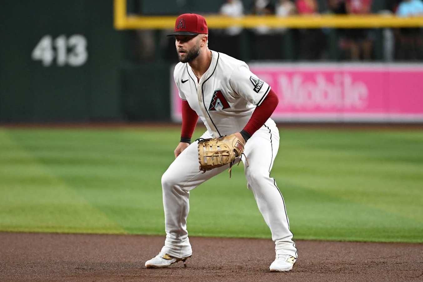 PHOENIX, ARIZONA - SEPTEMBER 25: Christian Walker #53 of the Arizona Diamondbacks gets ready to make a play against the San Francisco Giants at Chase Field on September 25, 2024 in Phoenix, Arizona. (Photo by Norm Hall/Getty Images)
