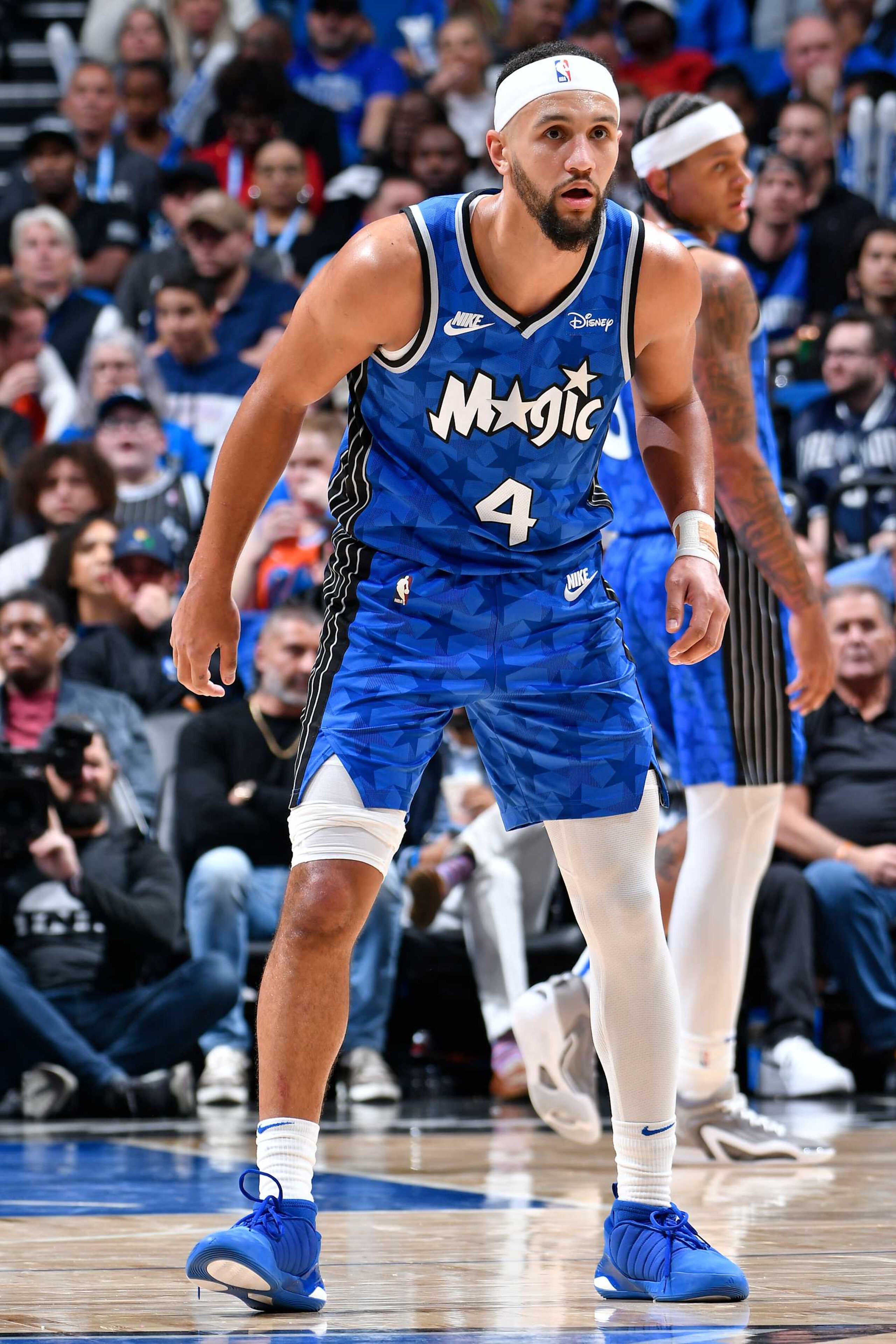 ORLANDO, FL - FEBRUARY 13: Jalen Suggs #4 of the Orlando Magic plays defense during the game against the Oklahoma City Thunder on February 13, 2024 at the Kia Center in Orlando, Florida. NOTE TO USER: User expressly acknowledges and agrees that, by downloading and or using this photograph, User is consenting to the terms and conditions of the Getty Images License Agreement. Mandatory Copyright Notice: Copyright 2024 NBAE (Photo by Fernando Medina/NBAE via Getty Images) ORLANDO, FL - FEBRUARY 13: Jalen Suggs #4 of the Orlando Magic plays defense during the game against the Oklahoma City Thunder on February 13, 2024 at the Kia Center in Orlando, Florida. NOTE TO USER: User expressly acknowledges and agrees that, by downloading and or using this photograph, User is consenting to the terms and conditions of the Getty Images License Agreement. Mandatory Copyright Notice: Copyright 2024 NBAE (Photo by Fernando Medina/NBAE via Getty Images)