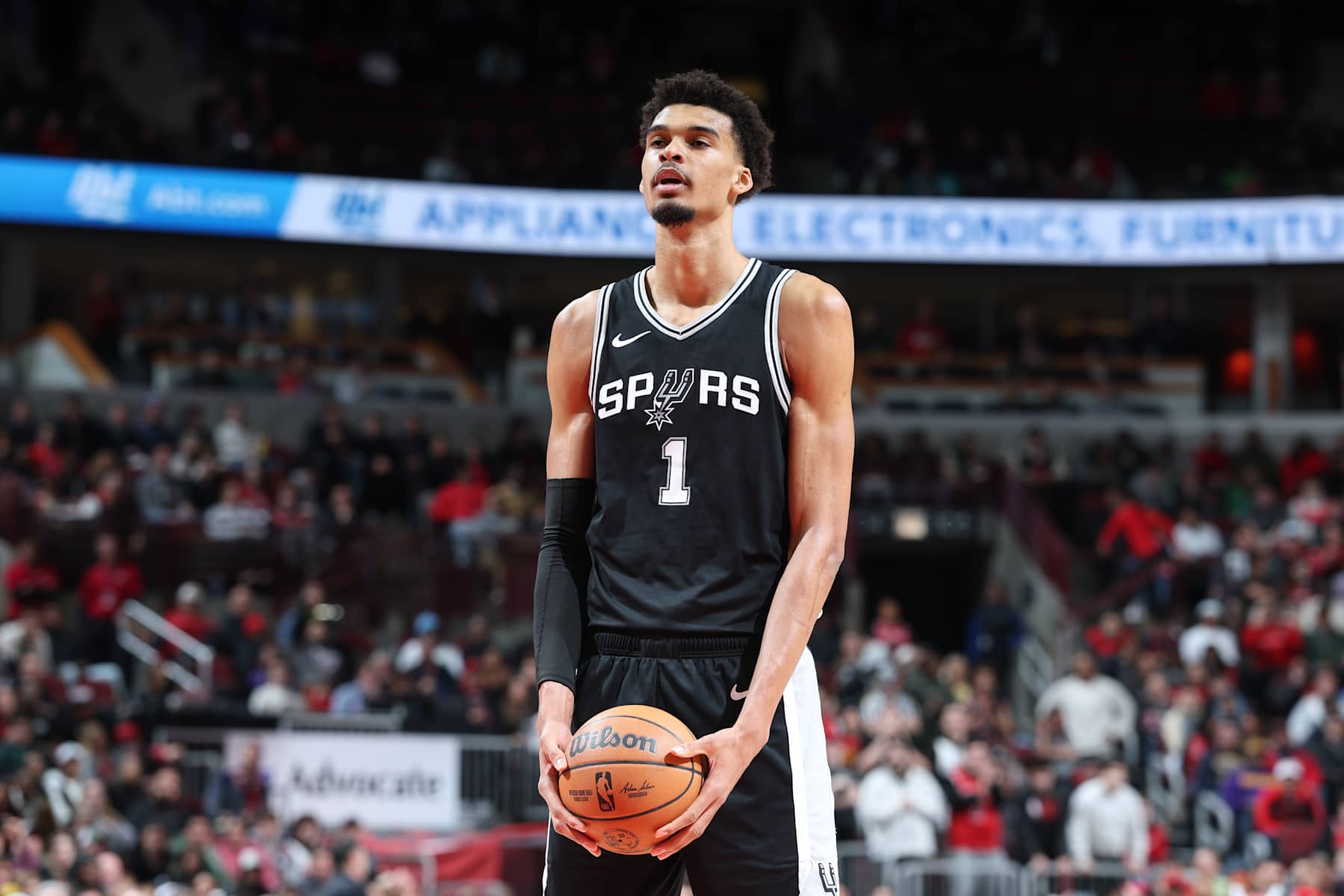 CHICAGO, IL - JANUARY 6:  Victor Wembanyama #1 of the San Antonio Spurs prepares to shoot a free throw during the game against the Chicago Bulls on January 6, 2025 at United Center in Chicago, Illinois. NOTE TO USER: User expressly acknowledges and agrees that, by downloading and or using this photograph, User is consenting to the terms and conditions of the Getty Images License Agreement. Mandatory Copyright Notice: Copyright 2025 NBAE (Photo by Jeff Haynes/NBAE via Getty Images)
