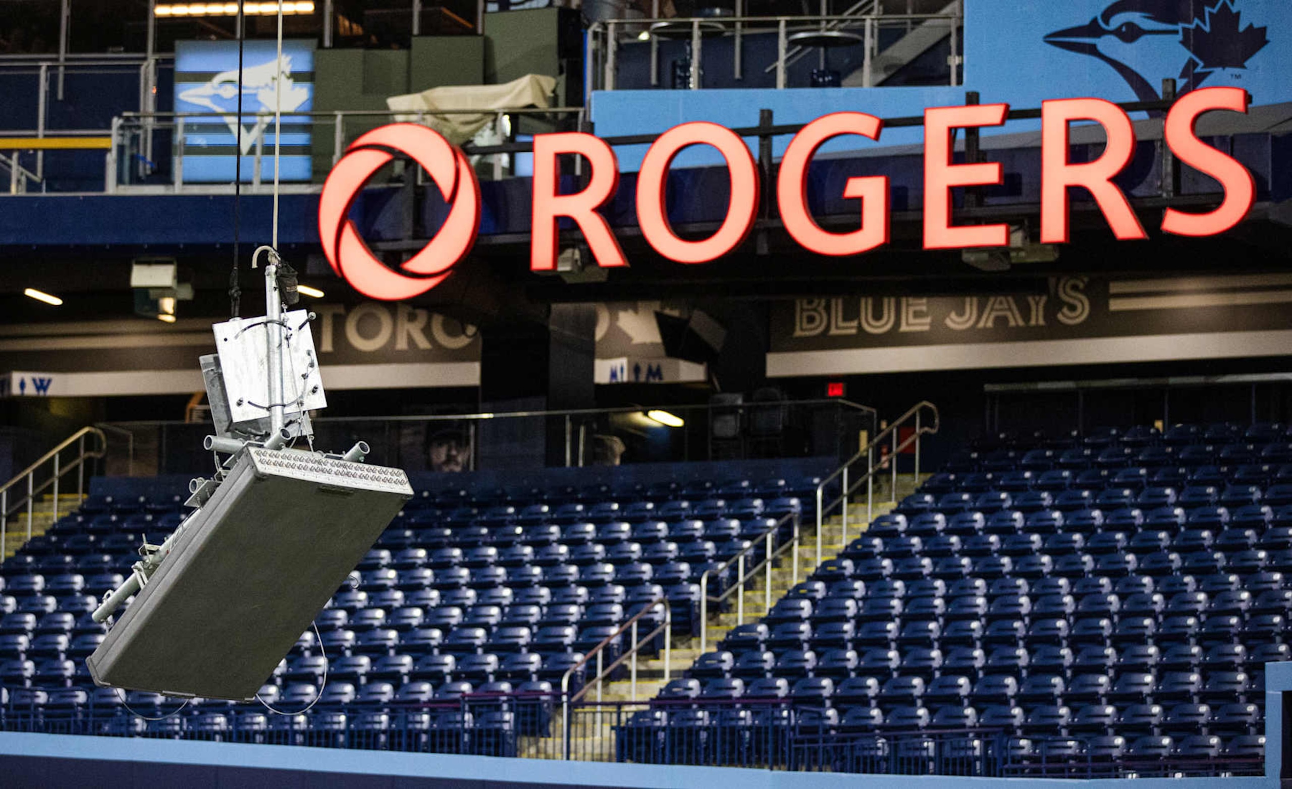 Toronto, ON - October 9: Riggers lower a cell transmitters so it can be fine tuned. The Rogers Centre upgrades its in house cell connectivity in preparation for increased capacity expected during the Taylor Swift eras tour concerts. PD Nick Lachance/Toronto Star Nick Lachance/Toronto Star        (Nick Lachance/Toronto Star via Getty Images)
