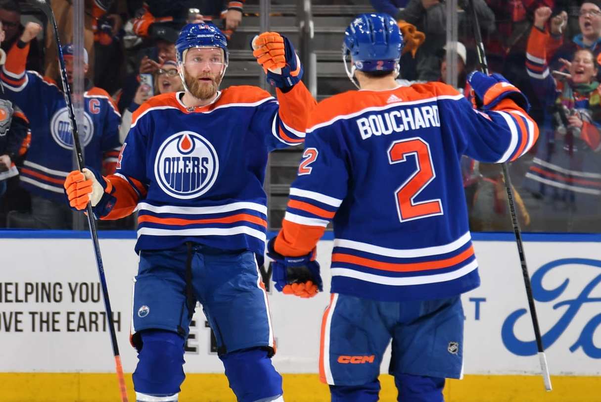 EDMONTON, CANADA - FEBRUARY 26: Evan Bouchard #2 of the Edmonton Oilers celebrates his third-period goal against the Los Angeles Kings with teammate Mattias Ekholm #14 at Rogers Place on February 26, 2024, in Edmonton, Alberta, Canada. (Photo by Andy Devlin/NHLI via Getty Images)