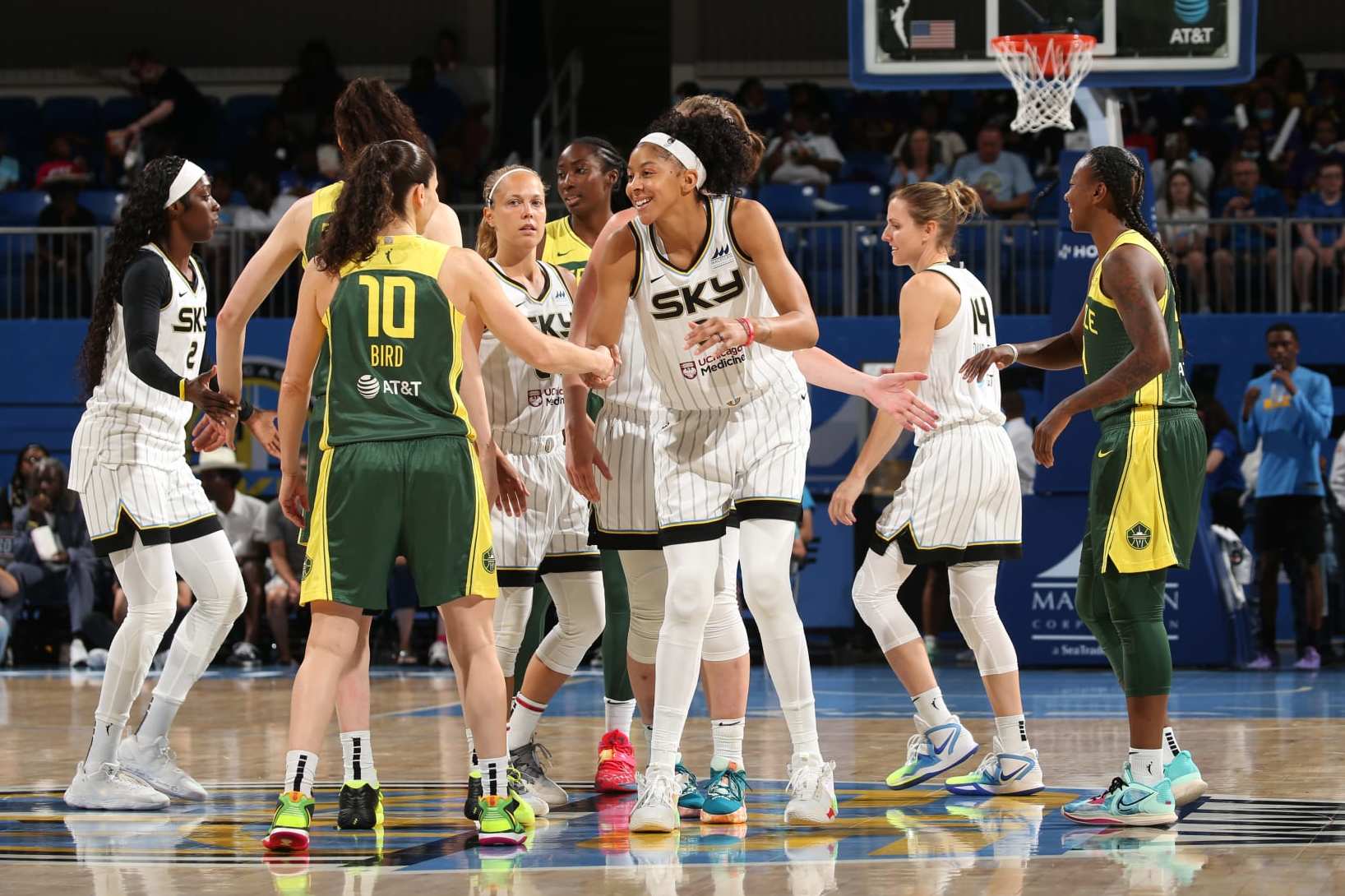 CHICAGO, IL - JULY 20: Sue Bird #10 of the Seattle Storm shakes hands with Candace Parker #3 of the Chicago Sky prior to the game on July 20, 2022 at the Wintrust Arena in Chicago, Illinois. NOTE TO USER: User expressly acknowledges and agrees that, by downloading and or using this photograph, user is consenting to the terms and conditions of the Getty Images License Agreement.  Mandatory Copyright Notice: Copyright 2022 NBAE (Photo by Gary Dineen/NBAE via Getty Images)