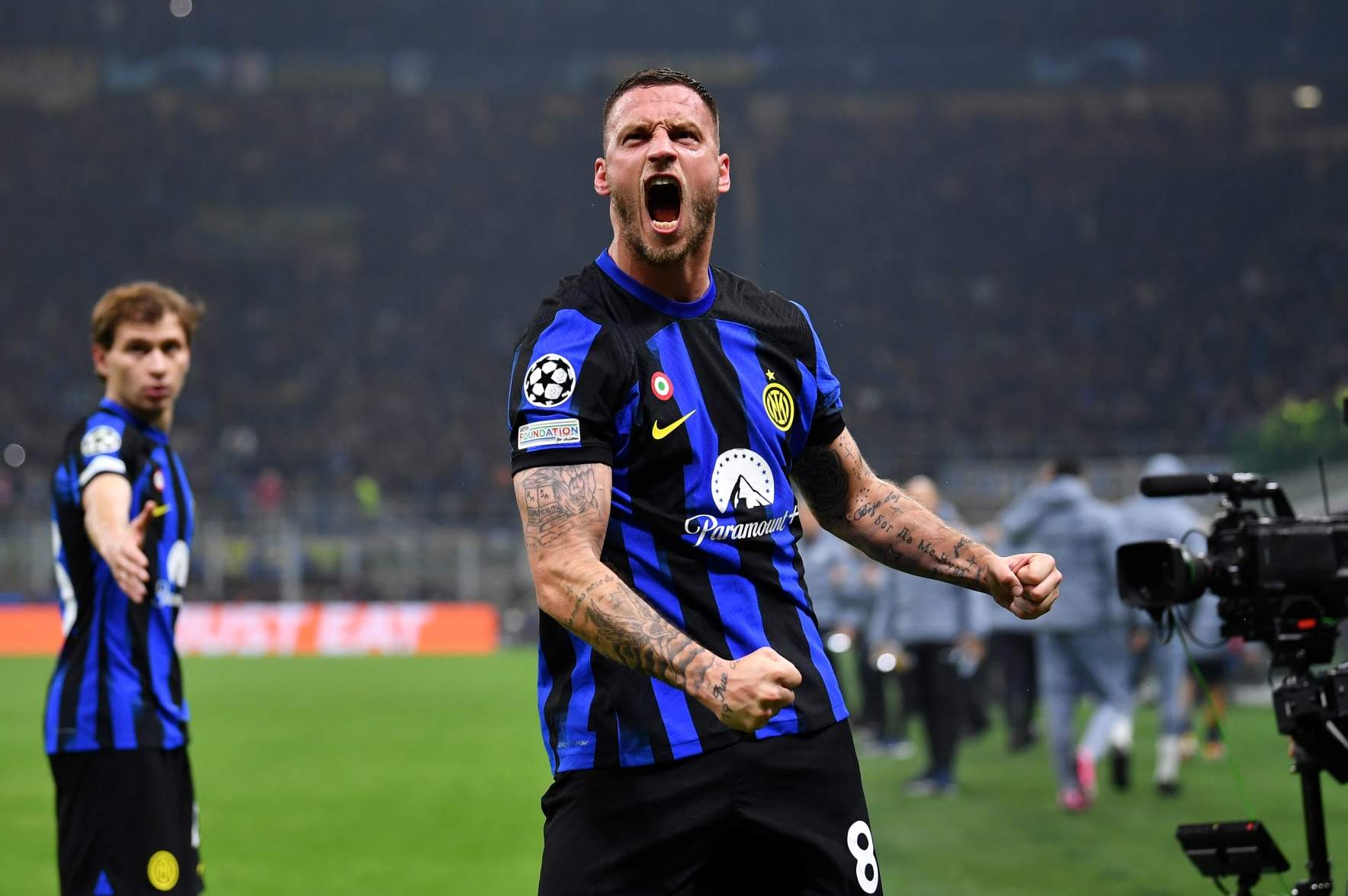 MILAN, ITALY - FEBRUARY 20: Marko Arnautovic of FC Internazionale celebrates scoring his team's first goal during the UEFA Champions League 2023/24 round of 16 first leg match between FC Internazionale and Atletico Madrid at Stadio Giuseppe Meazza on February 20, 2024 in Milan, Italy. (Photo by Valerio Pennicino - UEFA/UEFA via Getty Images)