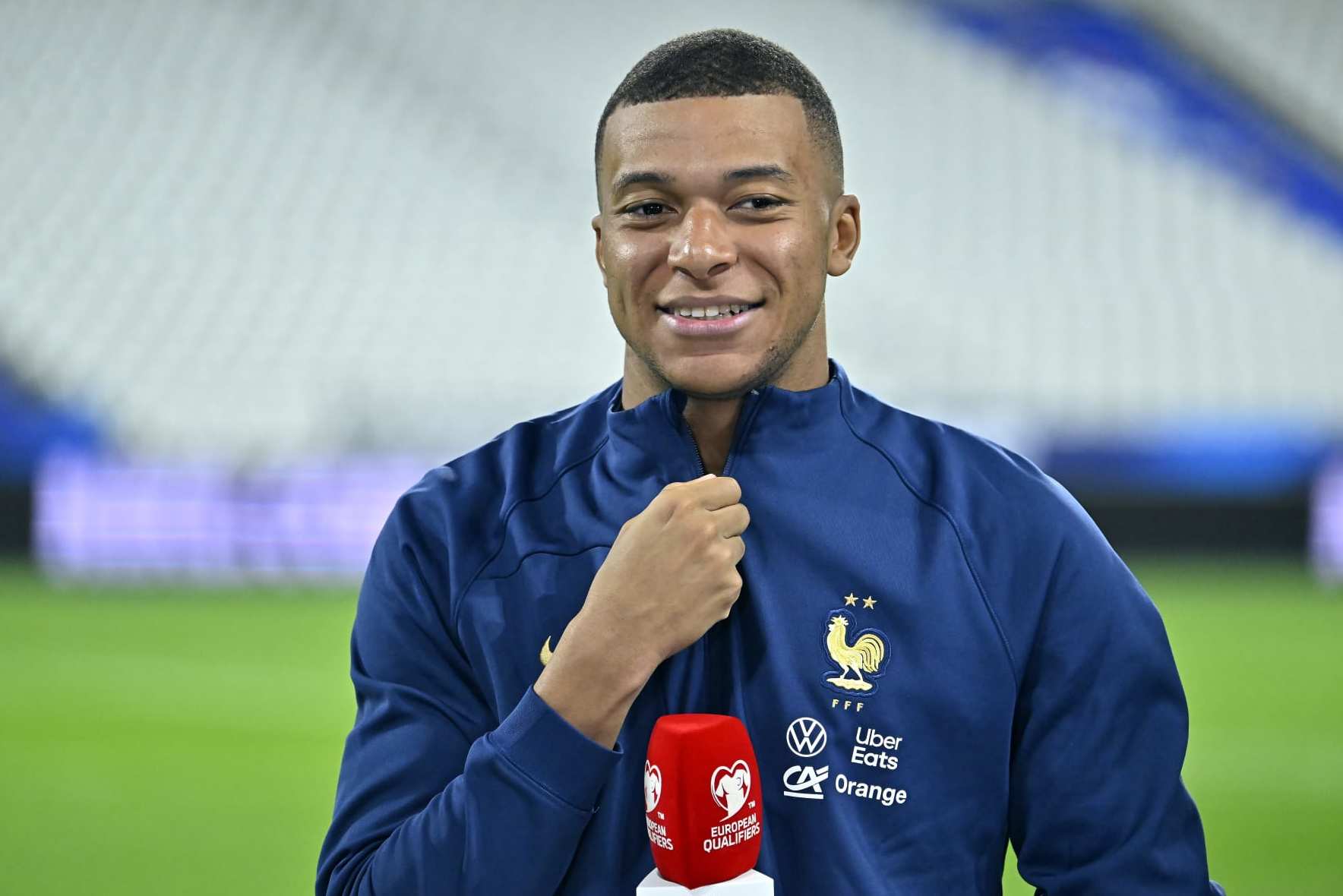 PARIS, FRANCE - JUNE 19: Kylian Mbappe of France  is interviewed after the team's victory in the UEFA EURO 2024 qualifying round group B match between France and Greece at Stade de France on June 19, 2023 in Paris, France. (Photo by Aurelien Meunier - UEFA/UEFA via Getty Images)