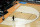 PORTLAND, OREGON - MARCH 31: Workers measure one of the two three-point lines and their different measurements after the Elite 8 round of the NCAA Women's Basketball Tournament between NC State Wolfpack and Texas Longhorns at Moda Center on March 31, 2024 in Portland, Oregon. (Photo by Steph Chambers/Getty Images)