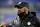 BALTIMORE, MD - JANUARY 06: Steelers head coach Mike Tomlin smiles while walking off the field after the Pittsburgh Steelers versus Baltimore Ravens NFL game at M&T Bank Stadium on January 6, 2024 in Baltimore, MD. (Photo by Randy Litzinger/Icon Sportswire via Getty Images)