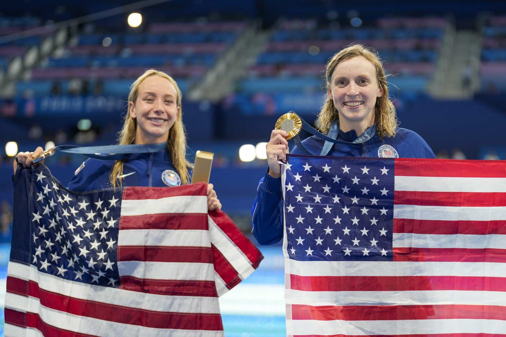 NANTERRE, FRANCE - AUGUST 3: Paige Madden of United States (L) and Katie Ledecky of United States (R) celebrate theirs medals after the Women's 800m Medals Ceremony on day eight of the Paris 2024 Olympic Games at Paris La Defense Arena on August 3, 2024 in Nanterre, France. (Photo by Eurasia Sport Images/Getty Images)