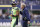 SEATTLE, WASHINGTON - OCTOBER 07: Quarterback Russell Wilson #3 talks with head coach Pete Carroll of the Seattle Seahawks during the first half against the Los Angeles Rams at Lumen Field on October 07, 2021 in Seattle, Washington. (Photo by Steph Chambers/Getty Images)