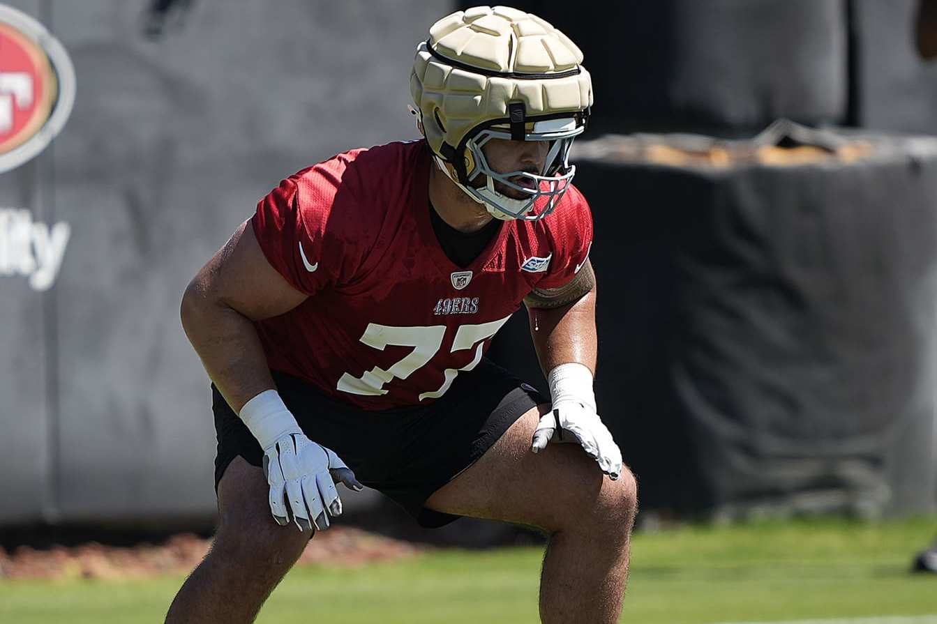 SANTA CLARA, CALIFORNIA - JUNE 04: Dominick Puni #77 of the San Francisco 49ers works out during mini camp on June 04, 2024 in Santa Clara, California. (Photo by Thearon W. Henderson/Getty Images)