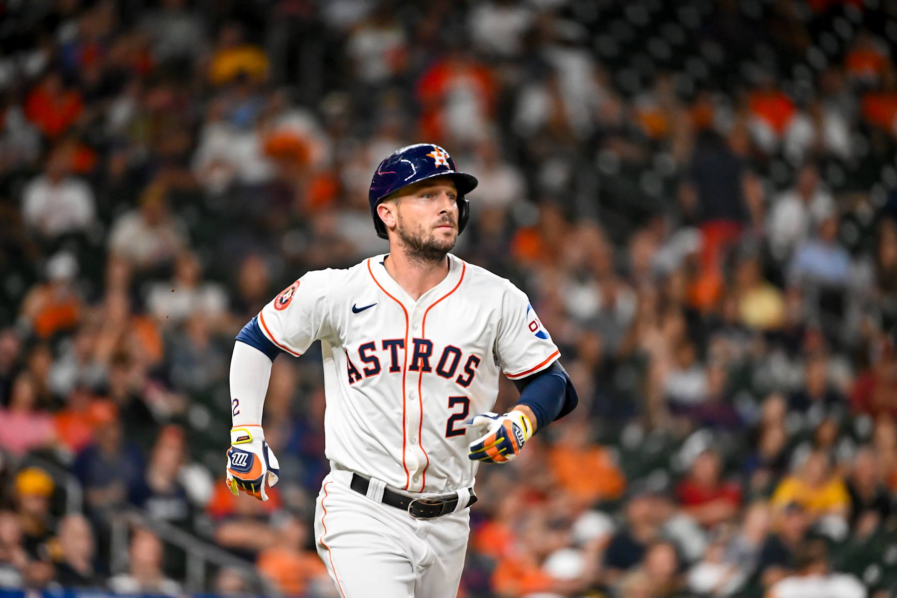 HOUSTON, TEXAS - JULY 30: Alex Bregman #2 of the Houston Astros runs to first base after batting against the Pittsburgh Pirates at Minute Maid Park on July 30, 2024 in Houston, Texas. (Photo by Logan Riely/Getty Images)