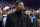 ESPN analyst Jalen Rose looks on prior to the first half of an NBA basketball game between the Los Angeles Lakers vs the Philadelphia 76ers, Saturday, Jan. 25, 2020, in Philadelphia. The 76ers won 108-91. (AP Photo/Chris Szagola)