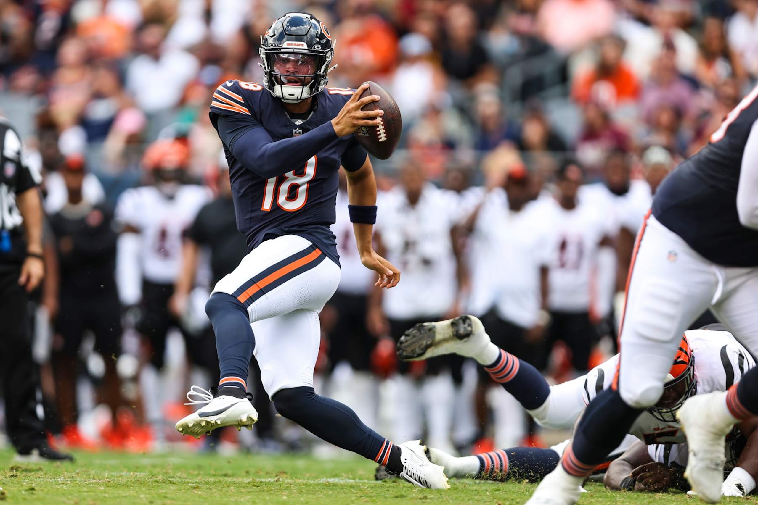 CHICAGO, IL - AUGUST 17: Caleb Williams #18 of the Chicago Bears runs the ball during at Solider Field on August 17, 2024 in Chicago, Illinois. (Photo by Perry Knotts/Getty Images) CHICAGO, IL - AUGUST 17: Caleb Williams #18 of the Chicago Bears runs the ball during at Solider Field on August 17, 2024 in Chicago, Illinois. (Photo by Perry Knotts/Getty Images)