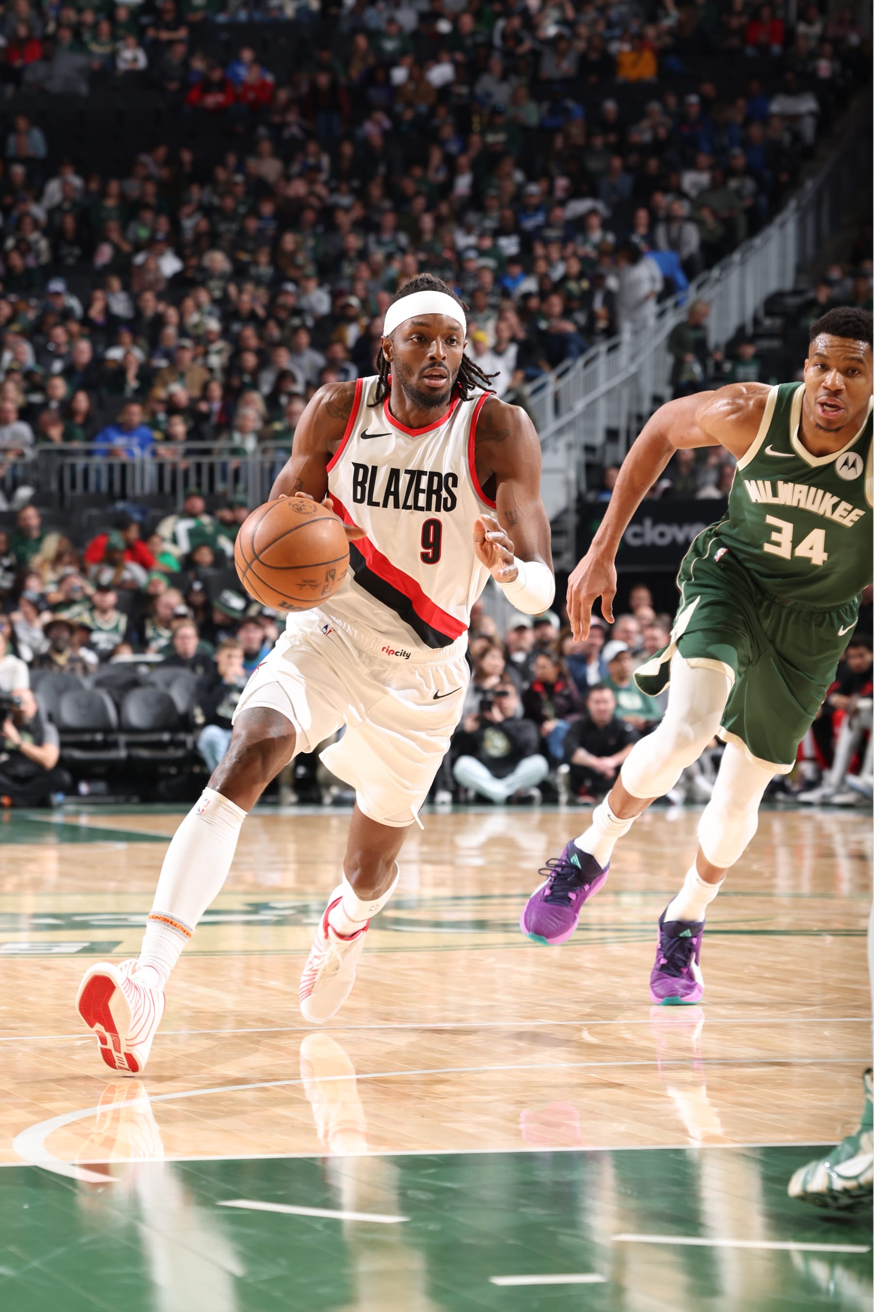 MILWAUKEE, WI - NOVEMBER 26: Jerami Grant #9 of the Portland Trail Blazers dribbles the ball during the game against the Milwaukee Bucks on November 26, 2023 at the Fiserv Forum Center in Milwaukee, Wisconsin. NOTE TO USER: User expressly acknowledges and agrees that, by downloading and or using this Photograph, user is consenting to the terms and conditions of the Getty Images License Agreement. Mandatory Copyright Notice: Copyright 2023 NBAE (Photo by Jeff Haynes/NBAE via Getty Images).