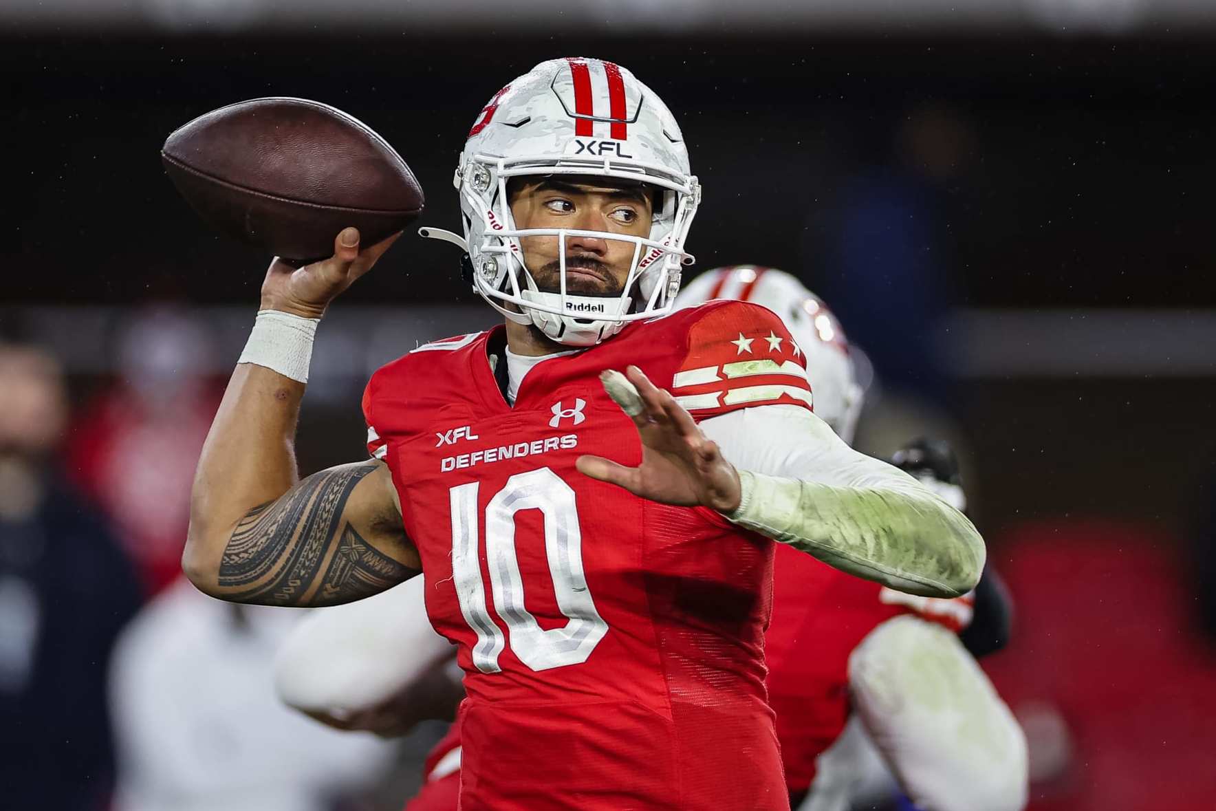 WASHINGTON, DC - MARCH 12: Jordan Ta'amu #10 of the DC Defenders attempts a pass against the Vegas Vipers during the first half of the XFL game at Audi Field on March 12, 2023 in Washington, DC. (Photo by Scott Taetsch/Getty Images)