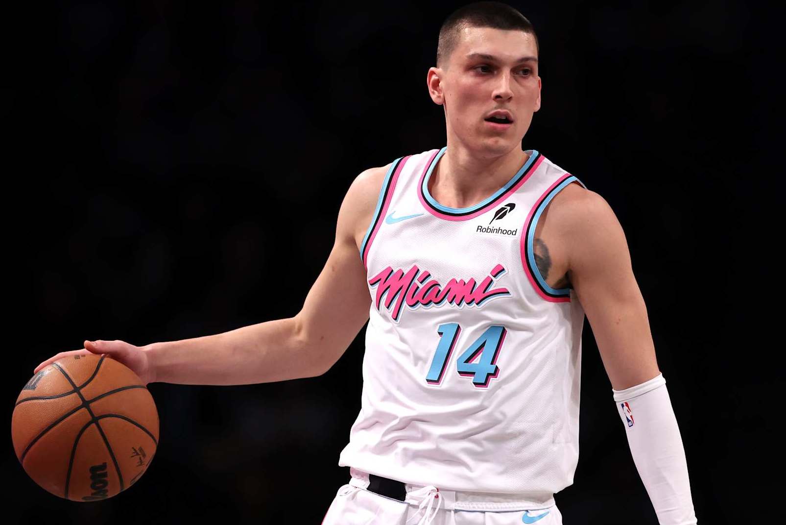 NEW YORK, NEW YORK - JANUARY 25: Tyler Herro #14 of the Miami Heat dribbles the ball during the second half against the Brooklyn Nets at Barclays Center on January 25, 2025 in New York City. NOTE TO USER: User expressly acknowledges and agrees that, by downloading and or using this photograph, User is consenting to the terms and conditions of the Getty Images License Agreement. (Photo by Jordan Bank/Getty Images)