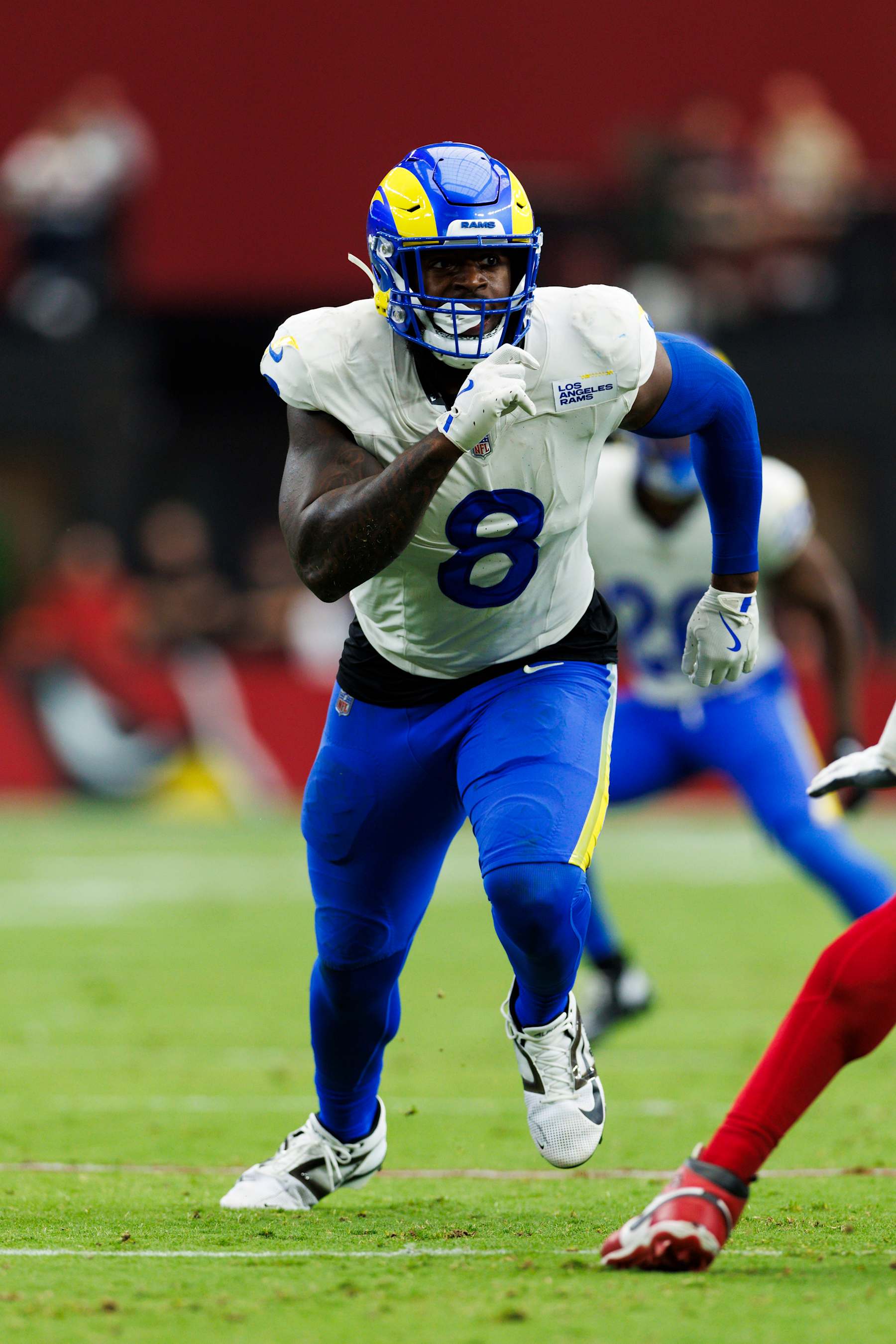 GLENDALE, ARIZONA - SEPTEMBER 15: Jared Verse #8 of the Los Angeles Rams rushes the edge during a game against the Arizona Cardinals at State Farm Stadium on September 15, 2024 in Glendale, Arizona. (Photo by Ric Tapia/Getty Images)