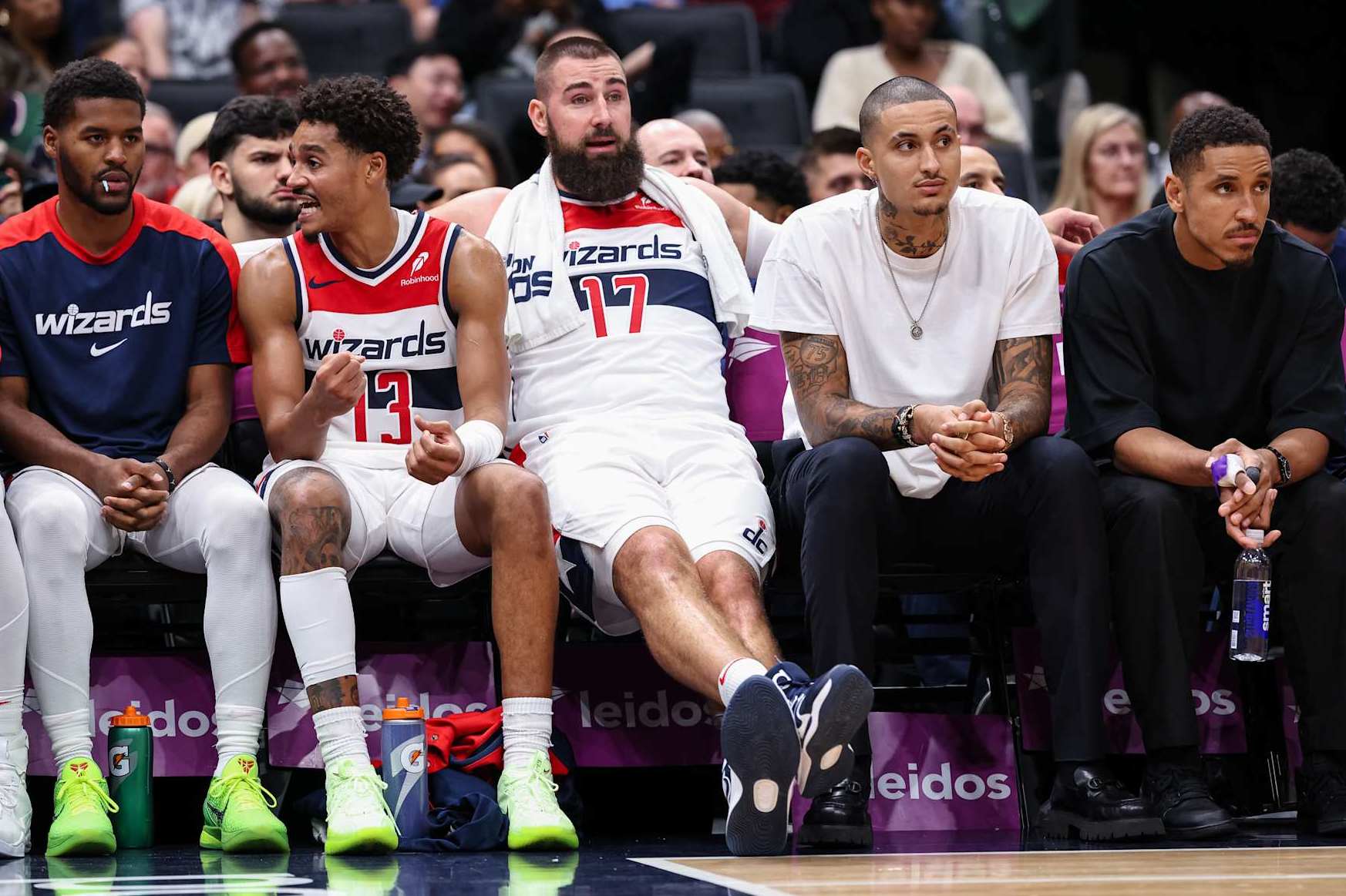 WASHINGTON, DC - OCTOBER 30: Jared Butler #4, Jordan Poole #13, Jonas Valanciunas #17, Kyle Kuzma #33, and Malcolm Brogdon #15 of the Washington Wizards look on from the bench during the second half against the Atlanta Hawks at Capital One Arena on October 30, 2024 in Washington, DC. NOTE TO USER: User expressly acknowledges and agrees that, by downloading and or using this photograph, User is consenting to the terms and conditions of the Getty Images License Agreement. (Photo by Scott Taetsch/Getty Images)