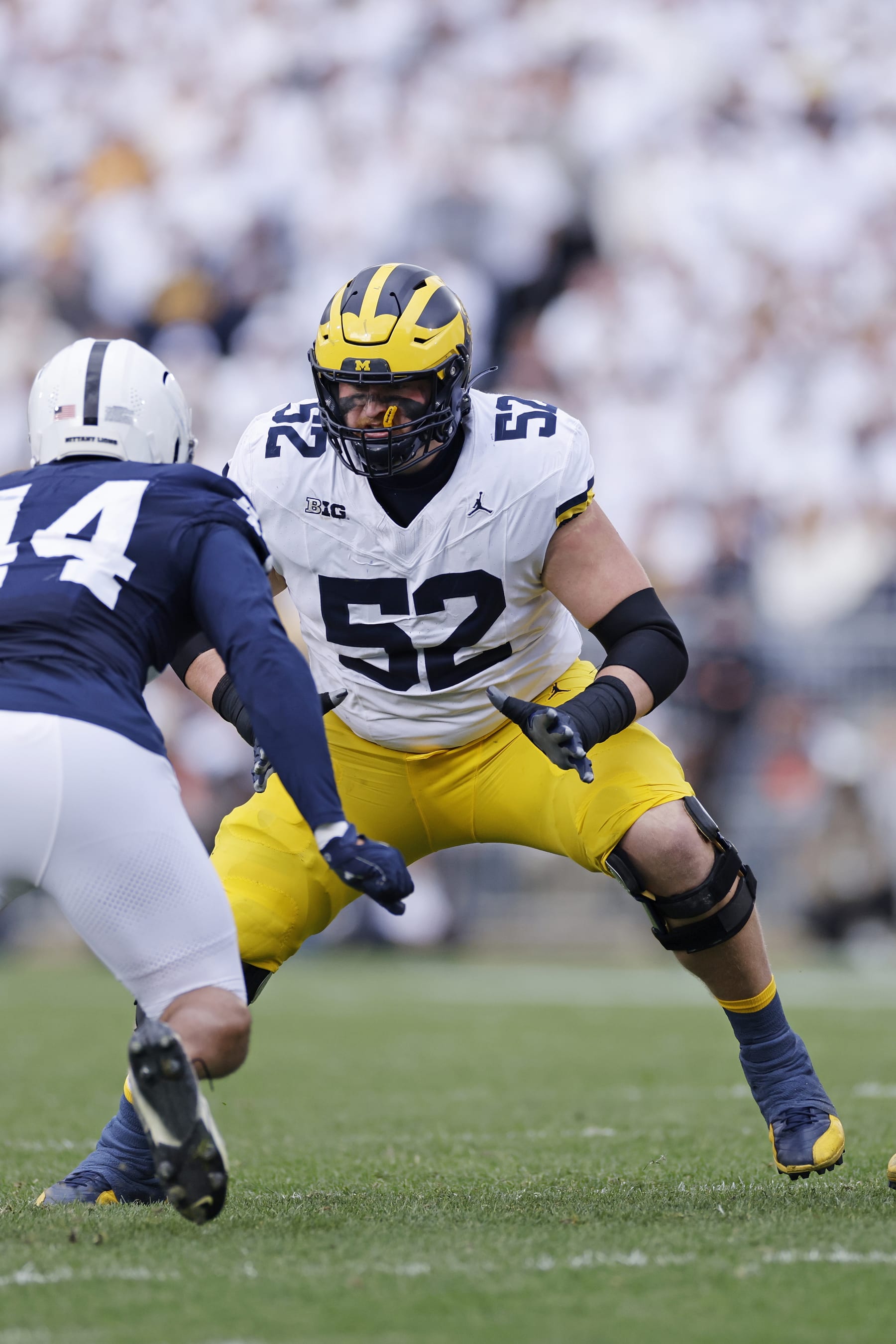 UNIVERSITY PARK, PA - NOVEMBER 11: Michigan Wolverines offensive lineman Karsen Barnhart (52) blocks during a college football game against the Penn State Nittany Lions on November 11, 2023 at Beaver Stadium in University Park, Pennsylvania. (Photo by Joe Robbins/Icon Sportswire via Getty Images)