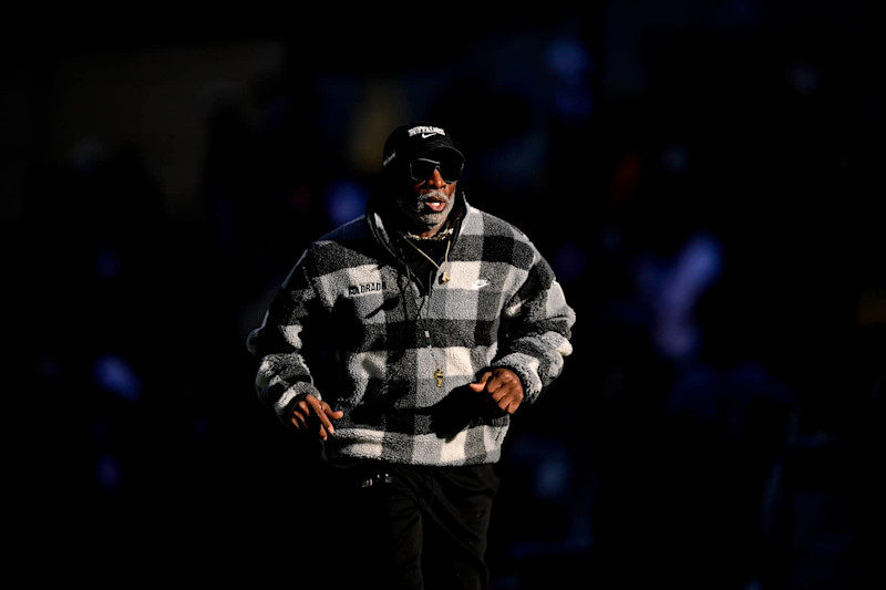 BOULDER, CO - NOVEMBER 16: Head coach Deion Sanders of the Colorado Buffaloes runs on the field before a game between the Colorado Buffaloes and the Utah Utes at Folsom Field on November 16, 2024 in Boulder, Colorado. (Photo by Dustin Bradford/Getty Images)