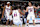 MEMPHIS, TENNESSEE - NOVEMBER 20: Tyrese Maxey #0 of the Philadelphia 76ers and Jared McCain #20 help Joel Embiid #21 during the second half against the Memphis Grizzlies at FedExForum on November 20, 2024 in Memphis, Tennessee. NOTE TO USER: User expressly acknowledges and agrees that, by downloading and or using this photograph, User is consenting to the terms and conditions of the Getty Images License Agreement. (Photo by Justin Ford/Getty Images)