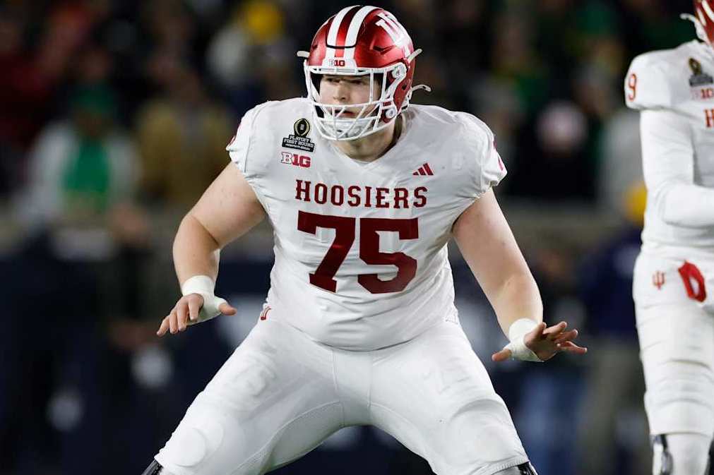 SOUTH BEND, IN - DECEMBER 20: Indiana Hoosiers offensive lineman Trey Wedig (75) blocks during the CFP First Round game against the Notre Dame Fighting Irish on December 20, 2024 at Notre Dame Stadium in South Bend, Indiana. (Photo by Joe Robbins/Icon Sportswire via Getty Images)