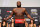 HOUSTON, TEXAS - FEBRUARY 11: Derrick Lewis poses on the scale during the UFC 271 ceremonial weigh-in at Toyota Center on February 11, 2022 in Houston, Texas. (Photo by Josh Hedges/Zuffa LLC)