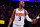 DENVER, CO - JUNE 13: Chris Paul #3 of the Phoenix Suns hi-fives teammates during Round 2, Game 4 of the 2021 NBA Playoffs on June 13, 2021 at the Ball Arena in Denver, Colorado. NOTE TO USER: User expressly acknowledges and agrees that, by downloading and/or using this Photograph, user is consenting to the terms and conditions of the Getty Images License Agreement. Mandatory Copyright Notice: Copyright 2021 NBAE (Photo by Barry Gossage/NBAE via Getty Images)