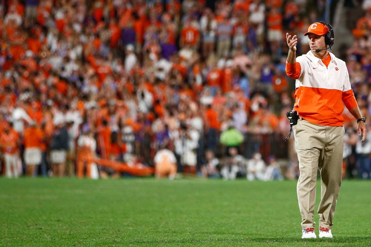 CLEMSON, SOUTH CAROLINA - NOVEMBER 18: Head coach Dabo Swinney of the Clemson Tigers signals to a player against the North Carolina Tar Heels at Memorial Stadium on November 18, 2023 in Clemson, South Carolina. (Photo by Isaiah Vazquez/Getty Images)