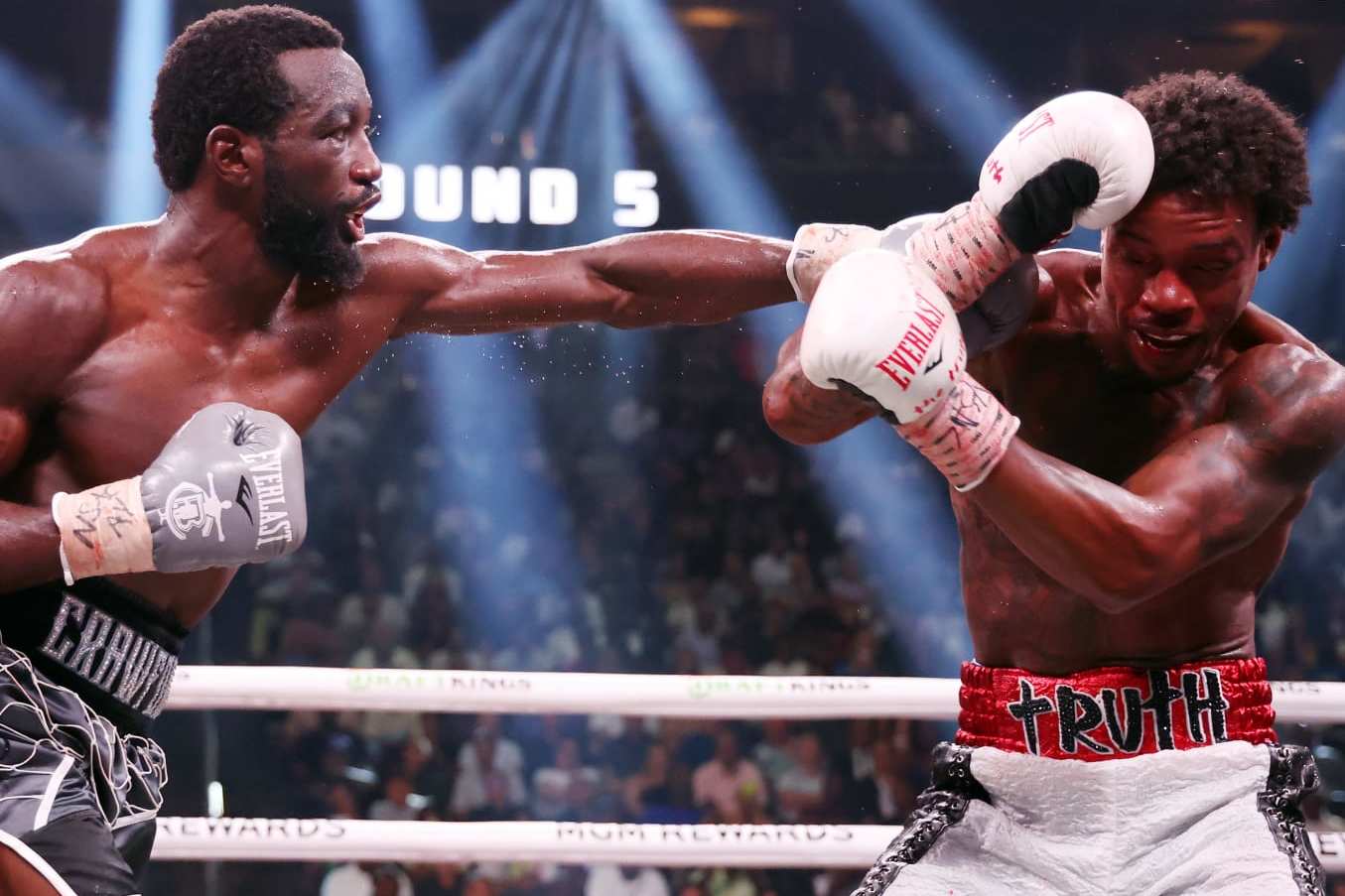 LAS VEGAS, NEVADA - JULY 29: Terence Crawford punches Errol Spence Jr. during round 5 of the World Welterweight Championship bout at T-Mobile Arena on July 29, 2023 in Las Vegas, Nevada. (Photo by Al Bello/Getty Images)