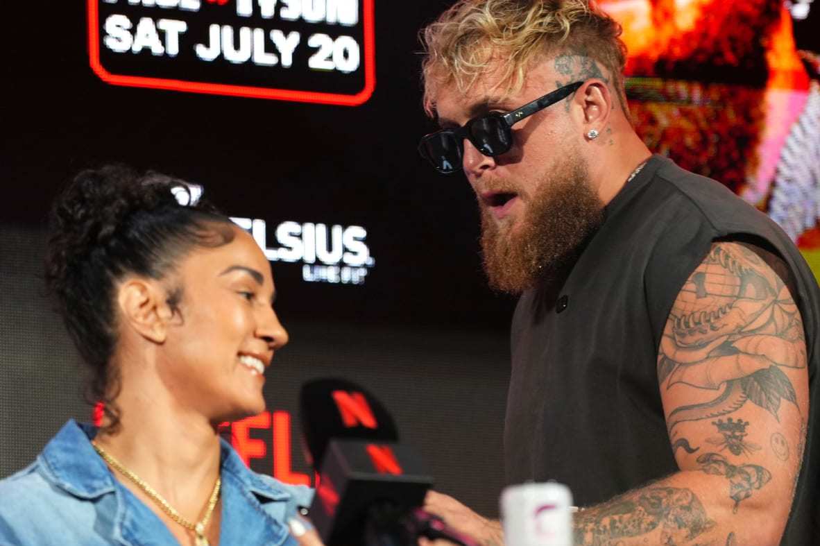ARLINGTON, TEXAS - MAY 16: (L-R) Amanda Serrano and Jake Paul onstage during the Jake Paul vs. Mike Tyson Boxing match Arlington press conference at Texas Live! on May 16, 2024 in Arlington, Texas. (Photo by Cooper Neill/Getty Images for Netflix)