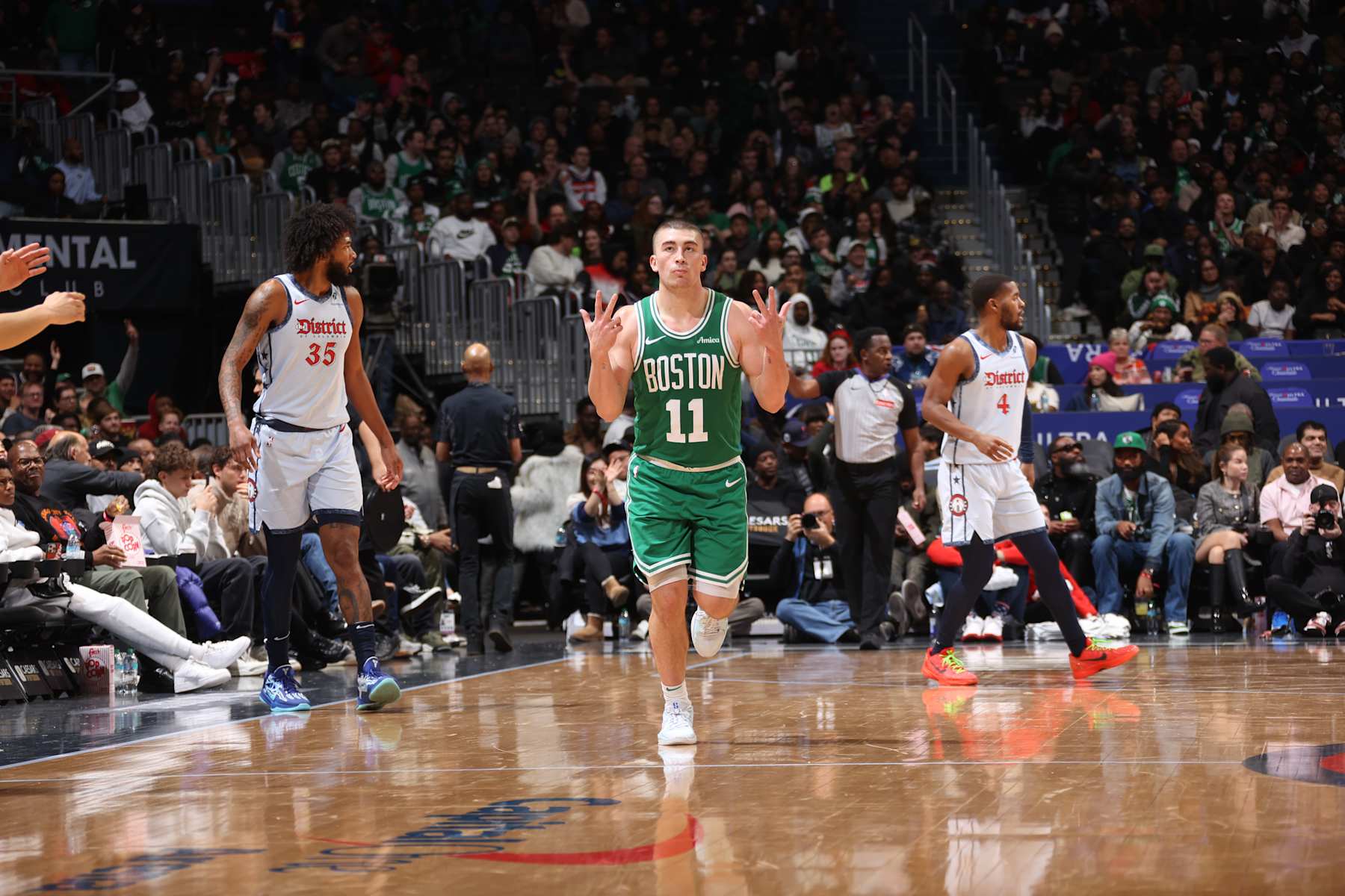 WASHINGTON, DC -  DECEMBER 15: Payton Pritchard #11 of the Boston Celtics celebrates during the game against the Washington Wizards during a regular season game on December 15, 2024 at Capital One Arena in Washington, DC. NOTE TO USER: User expressly acknowledges and agrees that, by downloading and or using this Photograph, user is consenting to the terms and conditions of the Getty Images License Agreement. Mandatory Copyright Notice: Copyright 2024 NBAE (Photo by Kenny Giarla/NBAE via Getty Images)