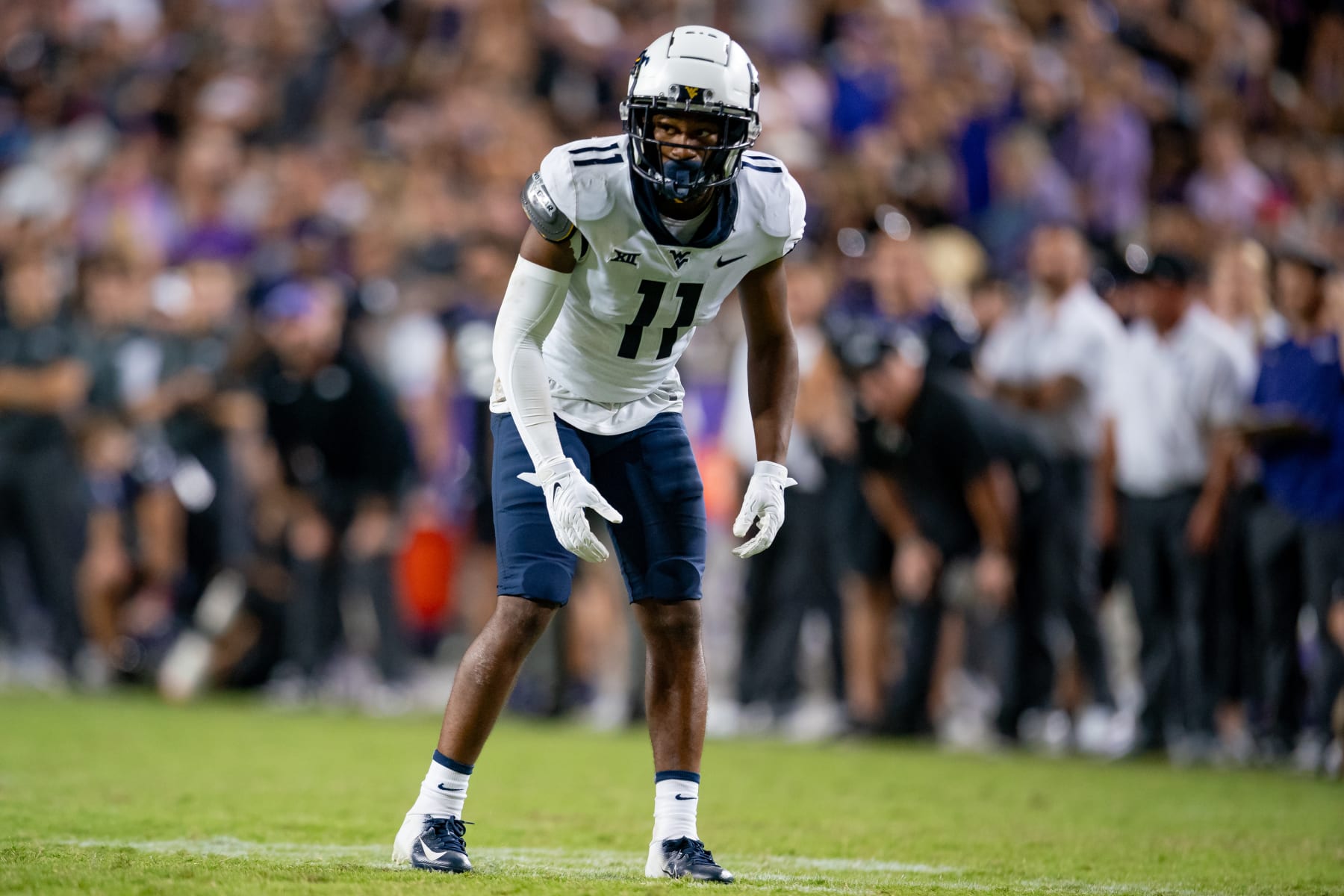 FORT WORTH, TX - SEPTEMBER 30: West Virginia Mountaineers cornerback Beanie Bishop Jr. (11) waits for the snap during a college football game between West Virginia Mountaineers and TCU Horned Frogs on Sept 30, 2023, at Amon G Cater Stadium in Fort Worth, TX.(Photo by Christopher Leduc/Icon Sportswire via Getty Images)