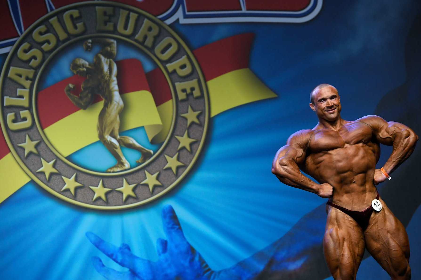 Belarusian bodybuilder Ilya Lukovets flexes his muscles for the judges during the Arnold Classic Europe 2019 bodybuilding competition in Barcelona on September 21, 2019. (Photo by LLUIS GENE / AFP)        (Photo credit should read LLUIS GENE/AFP via Getty Images)