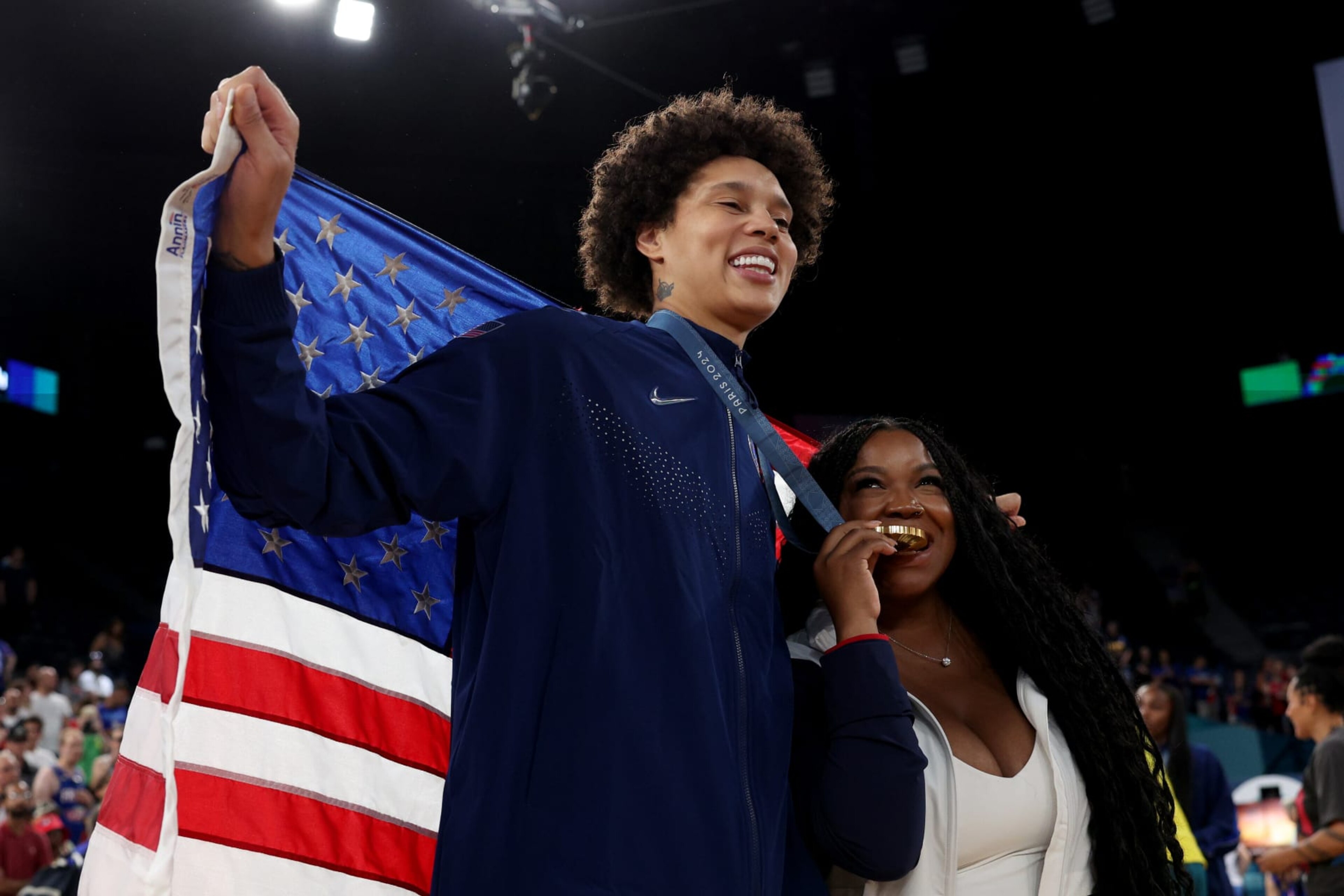 PARIS, FRANCE - AUGUST 11: Gold medalist Brittney Griner of Team United States poses for a photo with her wife, Cherelle Griner, during the Women's basketball medal ceremony on day sixteen of the Olympic Games Paris 2024 at Bercy Arena on August 11, 2024 in Paris, France. (Photo by Elsa/Getty Images) PARIS, FRANCE - AUGUST 11: Gold medalist Brittney Griner of Team United States poses for a photo with her wife, Cherelle Griner, during the Women's basketball medal ceremony on day sixteen of the Olympic Games Paris 2024 at Bercy Arena on August 11, 2024 in Paris, France. (Photo by Elsa/Getty Images)