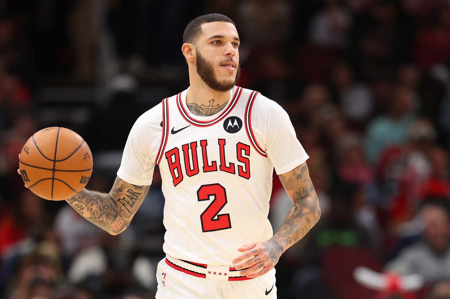 CHICAGO, ILLINOIS - OCTOBER 16: Lonzo Ball #2 of the Chicago Bulls dribbles up the court against the Minnesota Timberwolves during the first half of a preseason game at the United Center on October 16, 2024 in Chicago, Illinois. NOTE TO USER: User expressly acknowledges and agrees that, by downloading and or using this photograph, User is consenting to the terms and conditions of the Getty Images License Agreement.  (Photo by Michael Reaves/Getty Images)